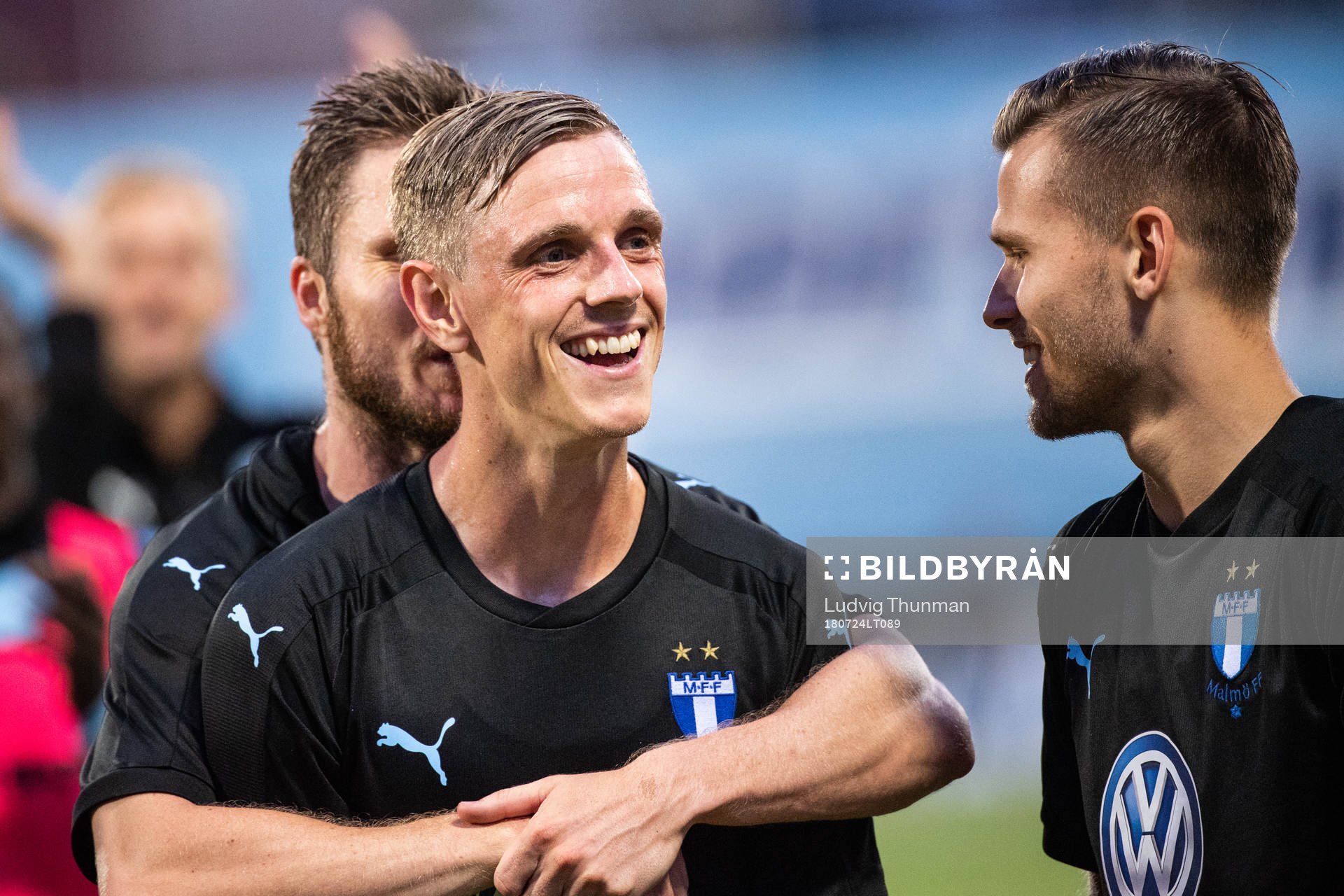 Lasse Nielsen hugs Sören Rieks of Malmö FF while