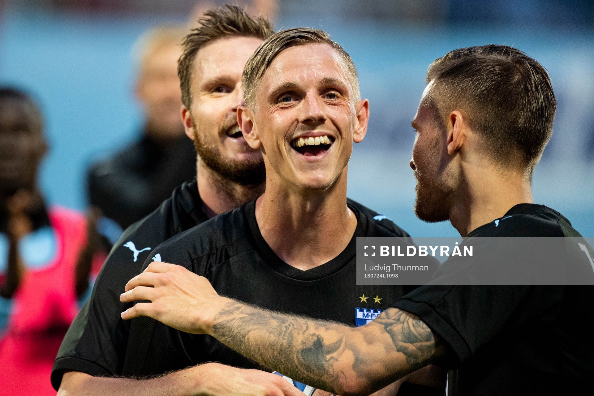 Sören Rieks celebrates with Lasse Nielsen and Arnór Ingvi