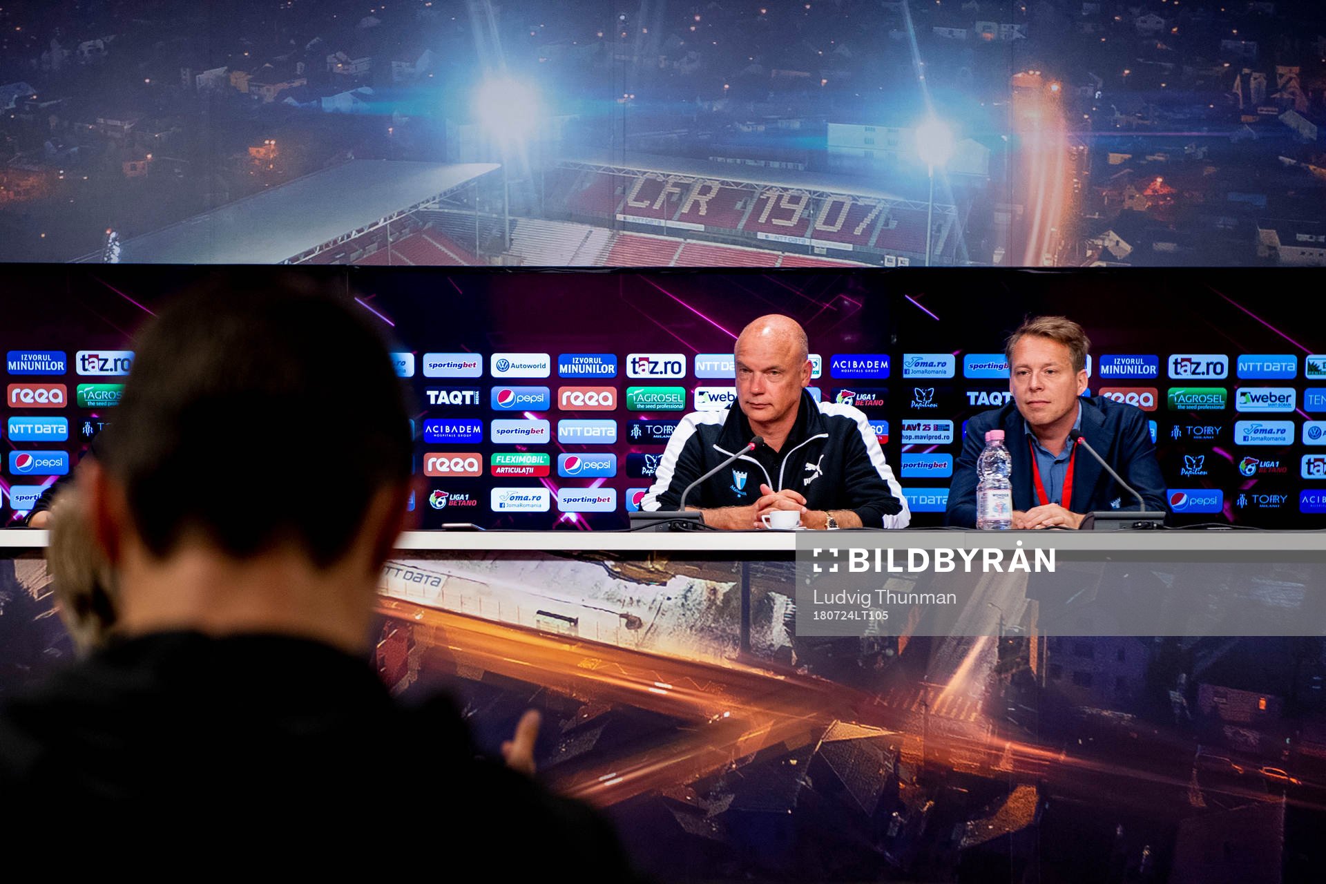 Head coach Uwe Rösler and press officer Peter Åhlander of Malmö FF during the press conference after the UEFA Champions League qualifying match between Cluj and Malmö FF on July 24, 2018 in Cluj.