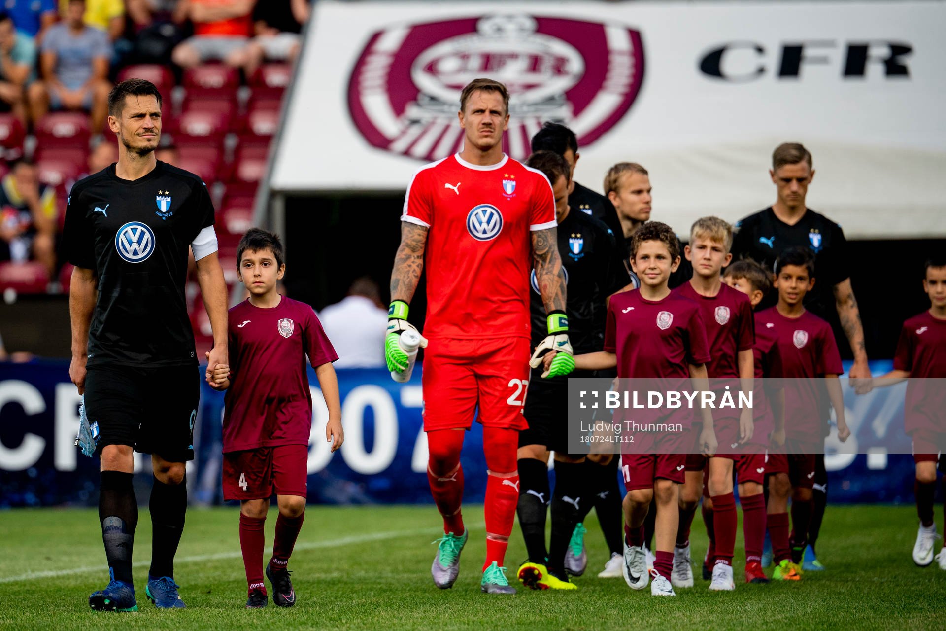 Markus Rosenberg and goalkeeper Johan Dahlin of Malmö FF