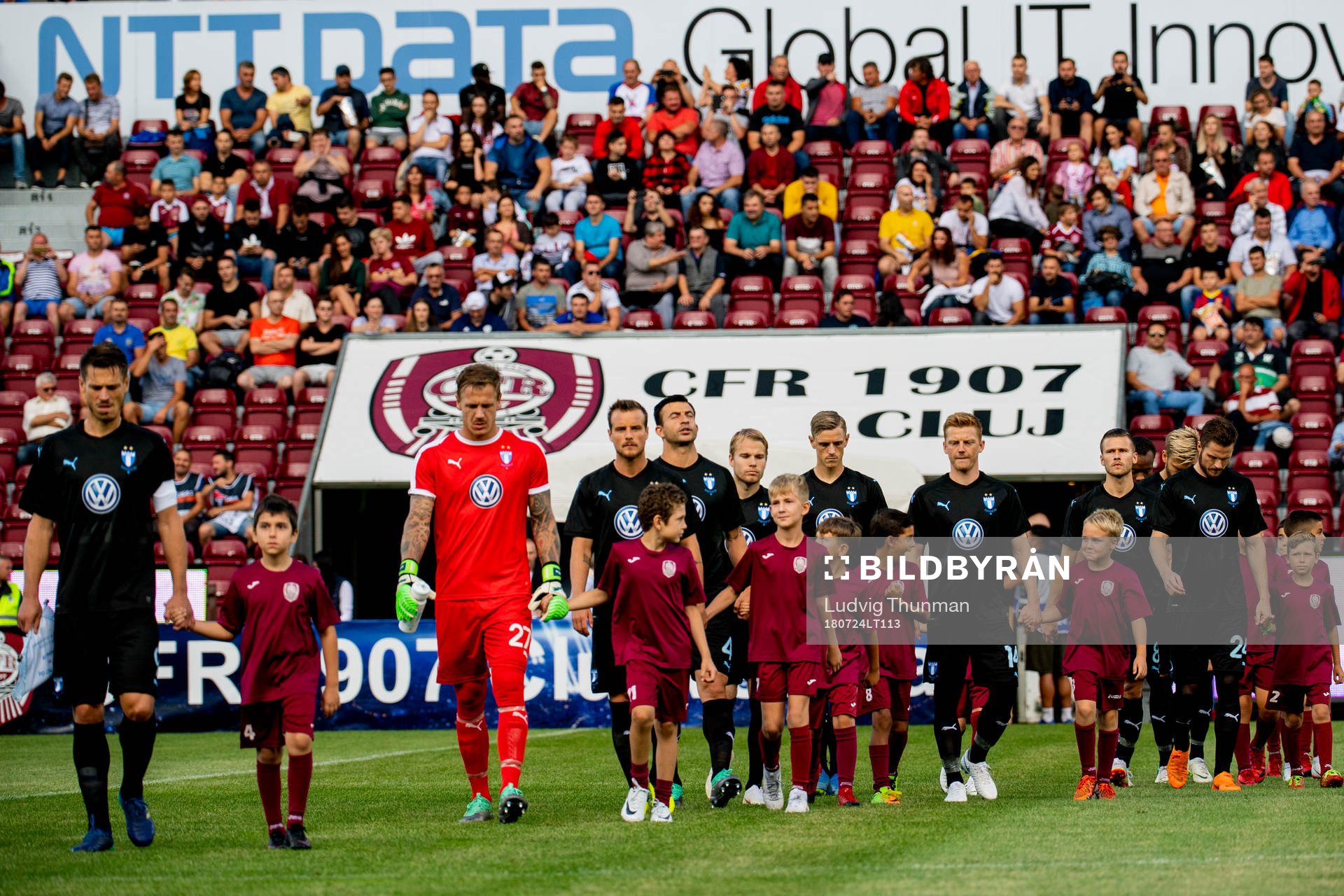 Players of Malmö FF enter the pitch