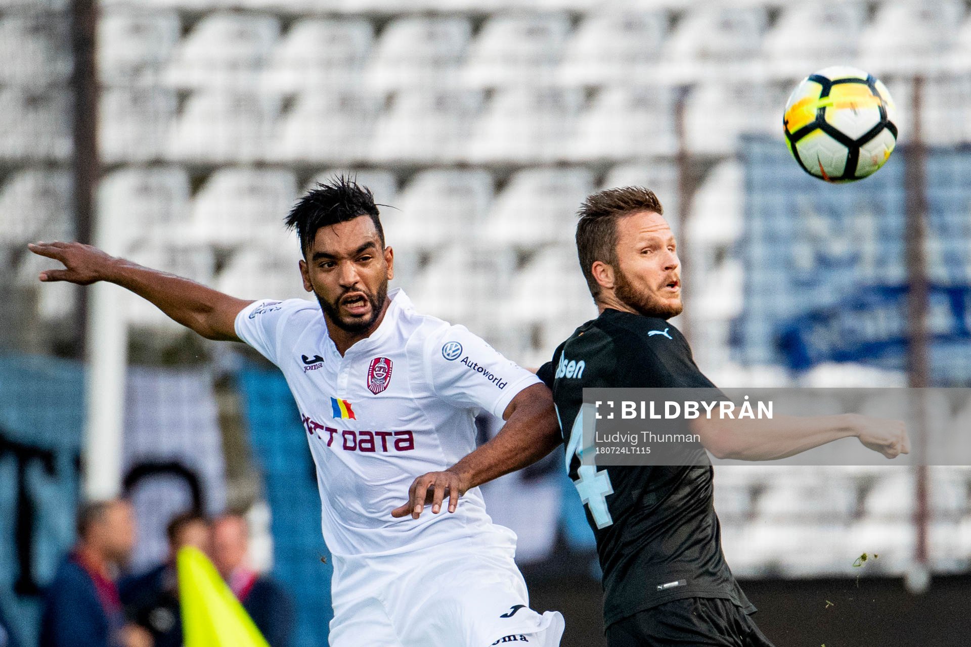 Billel Omrani of Cluj and Lasse Nielsen of Malmö FF