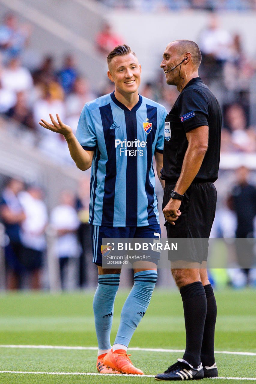 Fredrik Ulvestad of Djurgården and referee Miroslav Zelinka