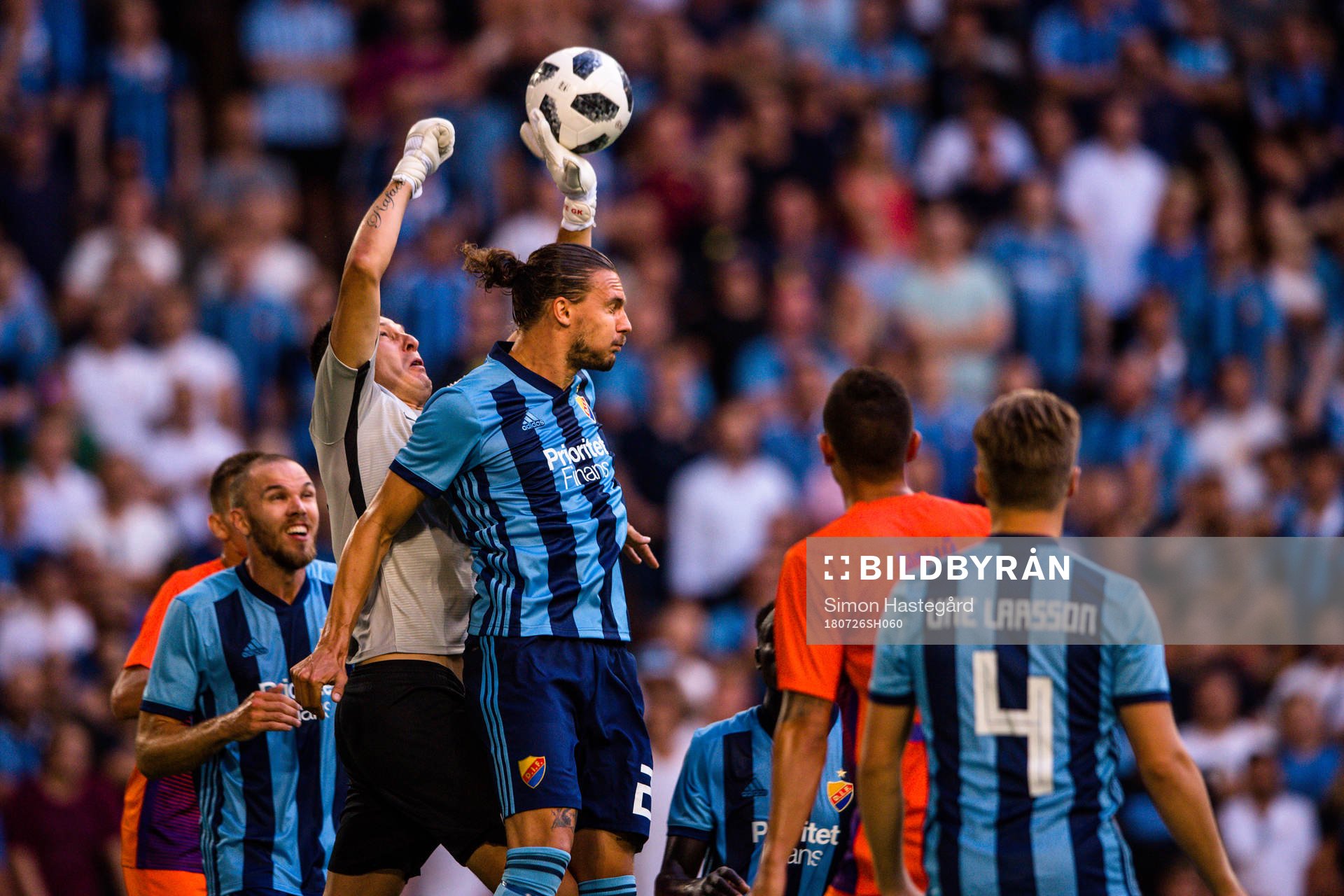 Goalkeeper Rustam Khudzhamov of Mariupol and Erik Johansson