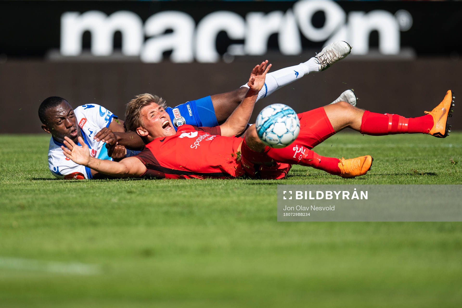 Steffen Lie Skålevik of Brann is tackled by Ben Karamoko