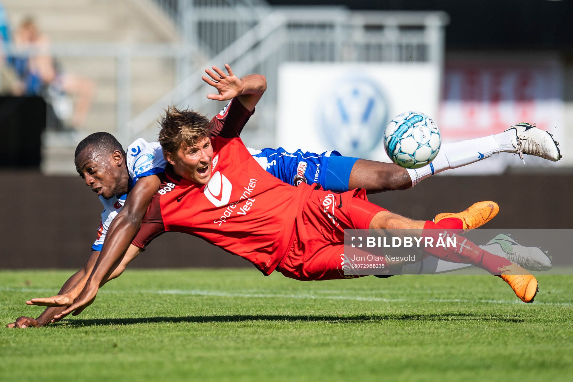 Steffen Lie Skålevik of Brann is tackled by Ben Karamoko