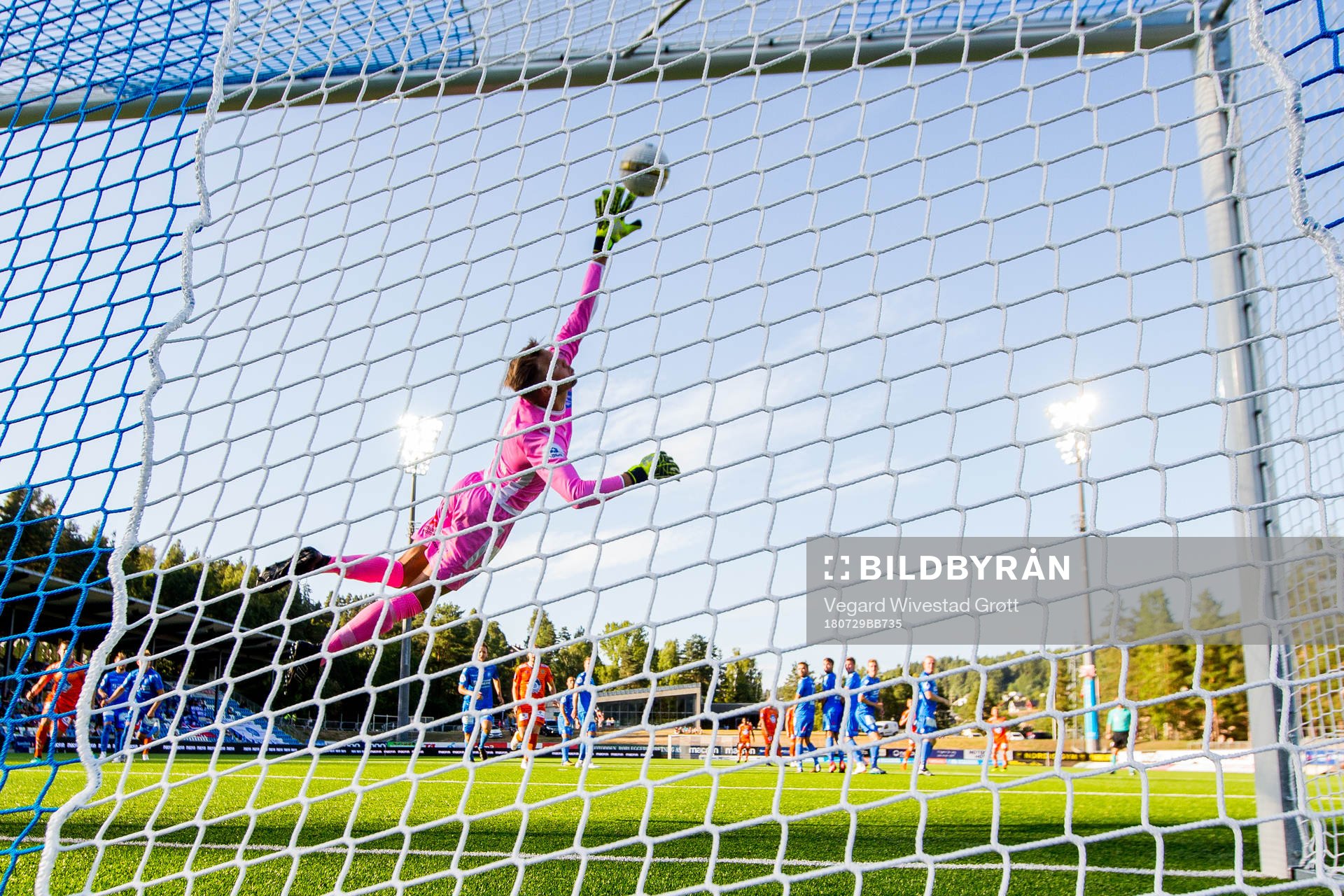 Goalkeeper Nils Jonathan Johansson of Notodden with a save during the OBOS-ligaen match between Notodden and Aalesund on July 29, 2018 in Notodden.