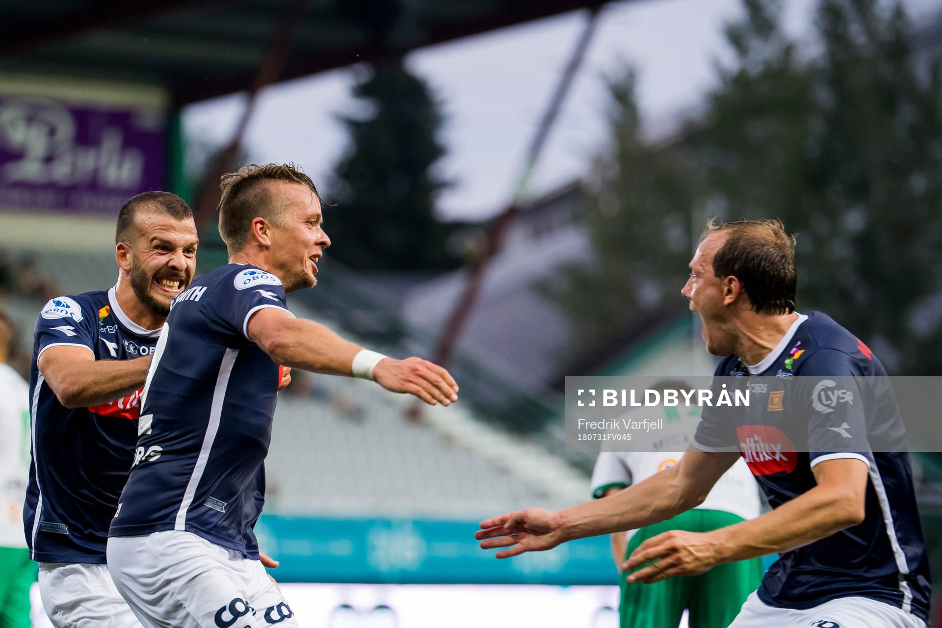 Claes Kronberg of Viking celebrates with his teammates