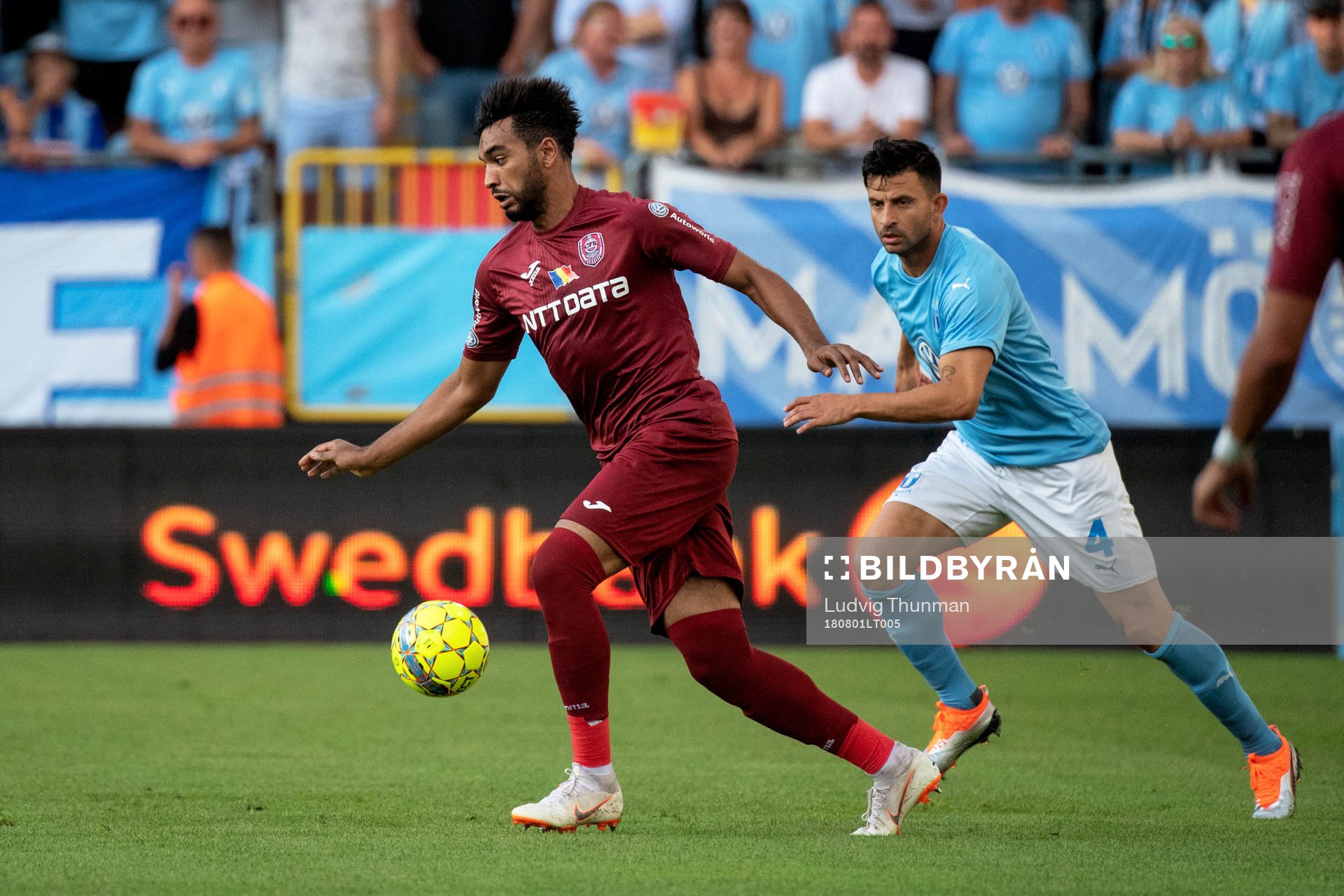 Billel Omrani of Cluj and Behrang Safari of Malmö FF
