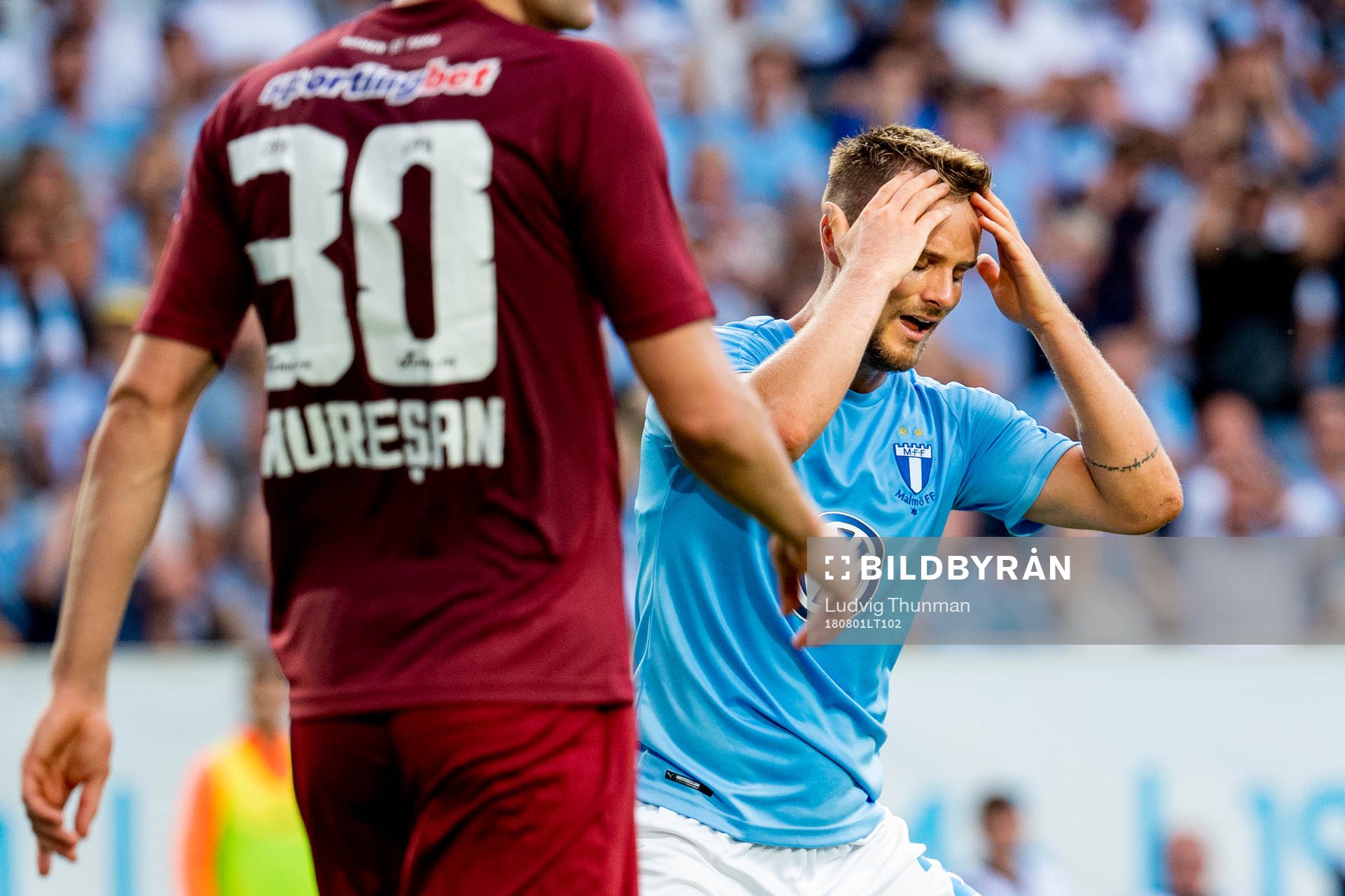 Eric Larsson of Malmö FF looks dejected