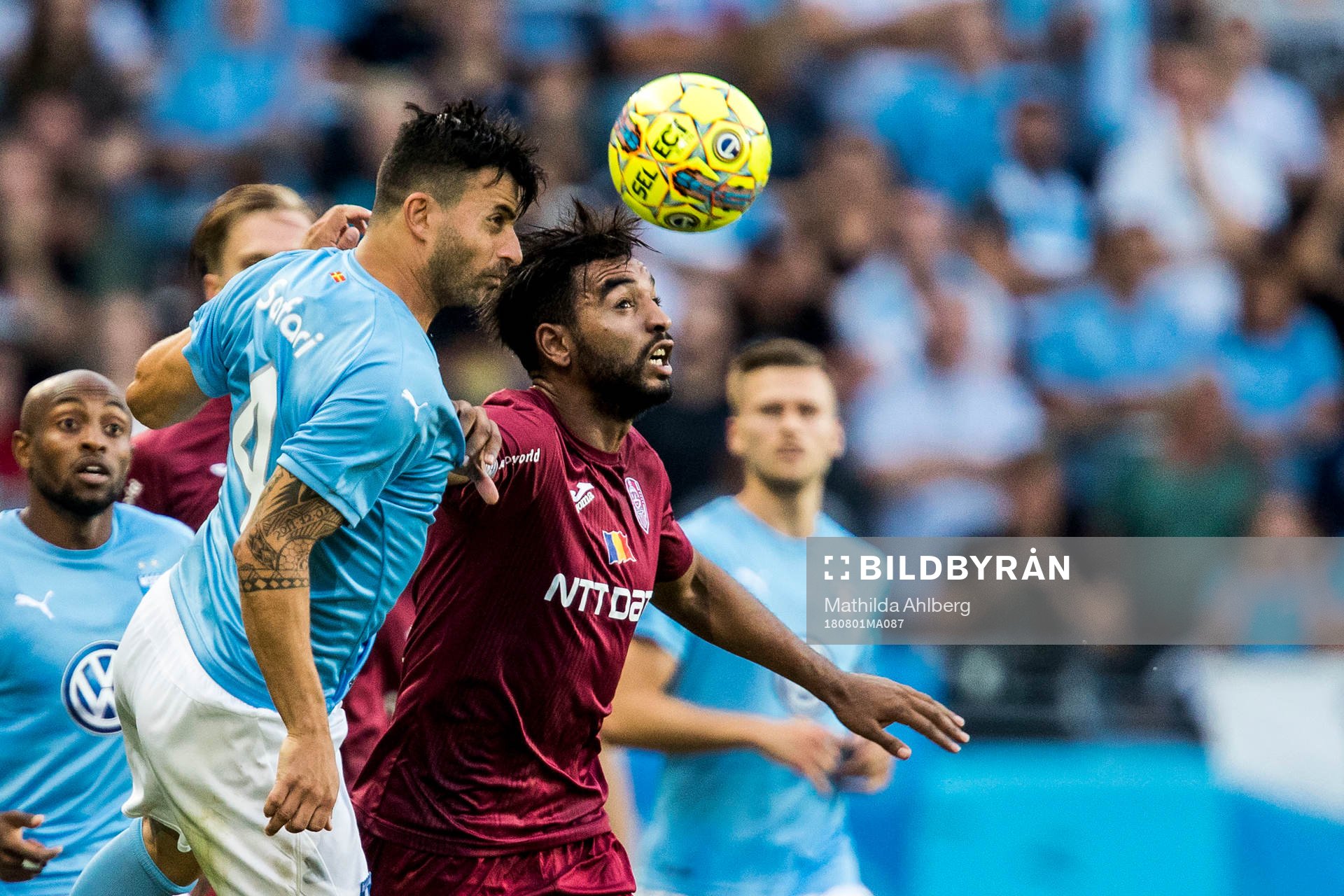 Behrang Safari of Malmö FF and Billel Omrani of Cluj