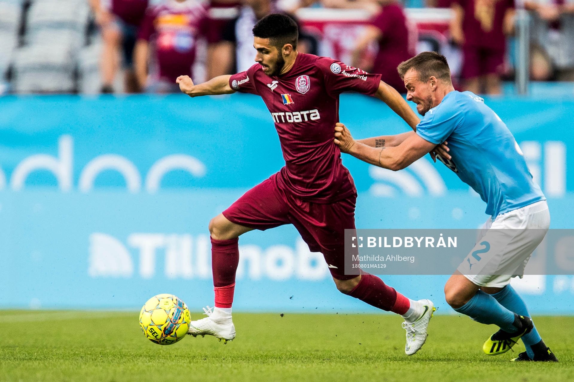 Sebastian Mailat of Cluj and Eric Larsson of Malmö FF