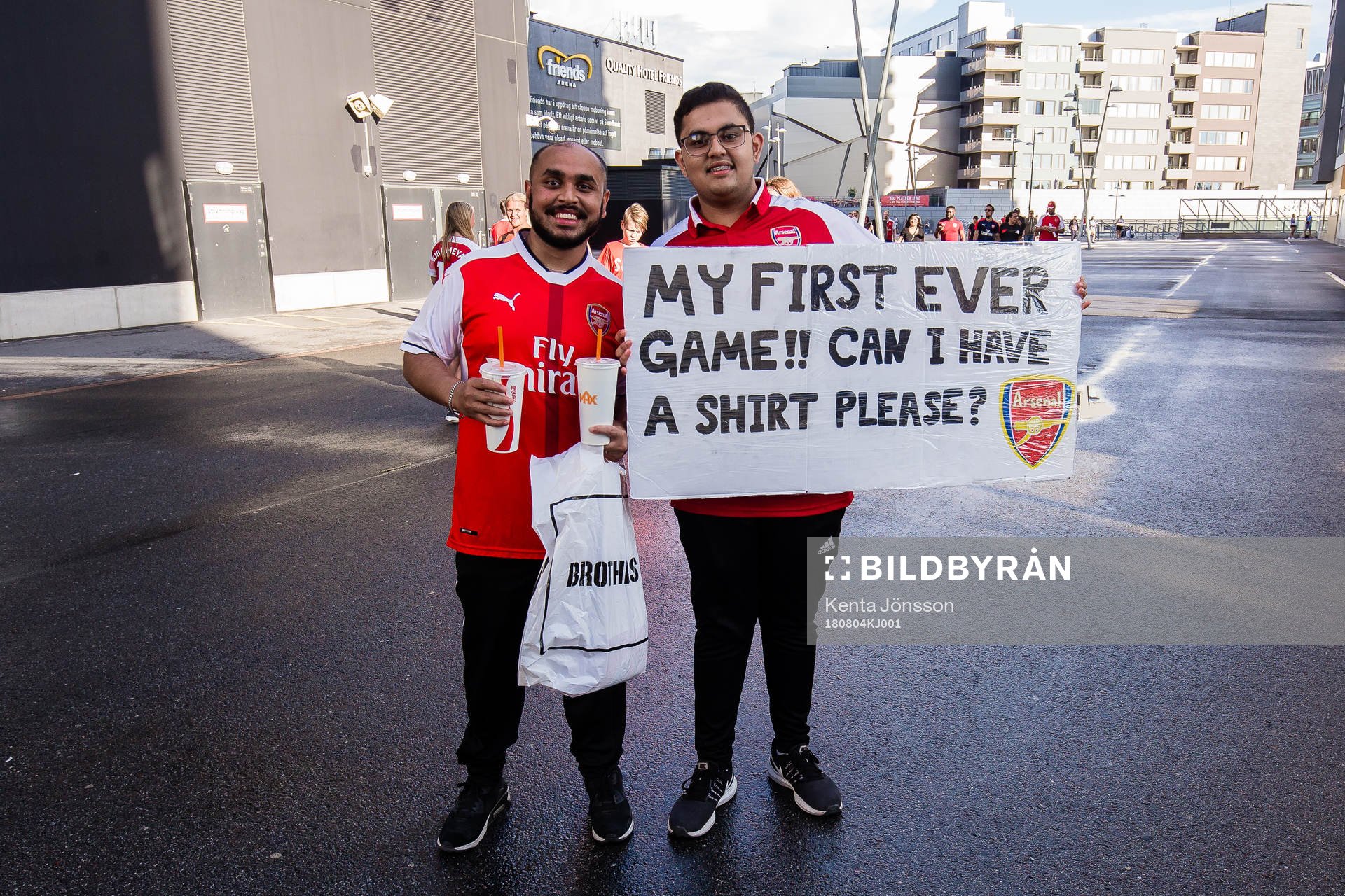 Fans of Arsenal outside of Friends Arena prior to the