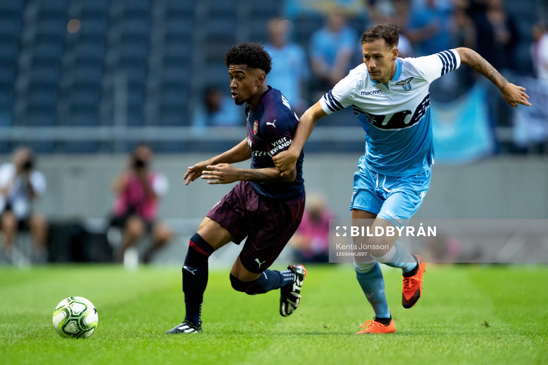 Reiss Nelson of Arsenal and Alessandro Murgia of Lazio