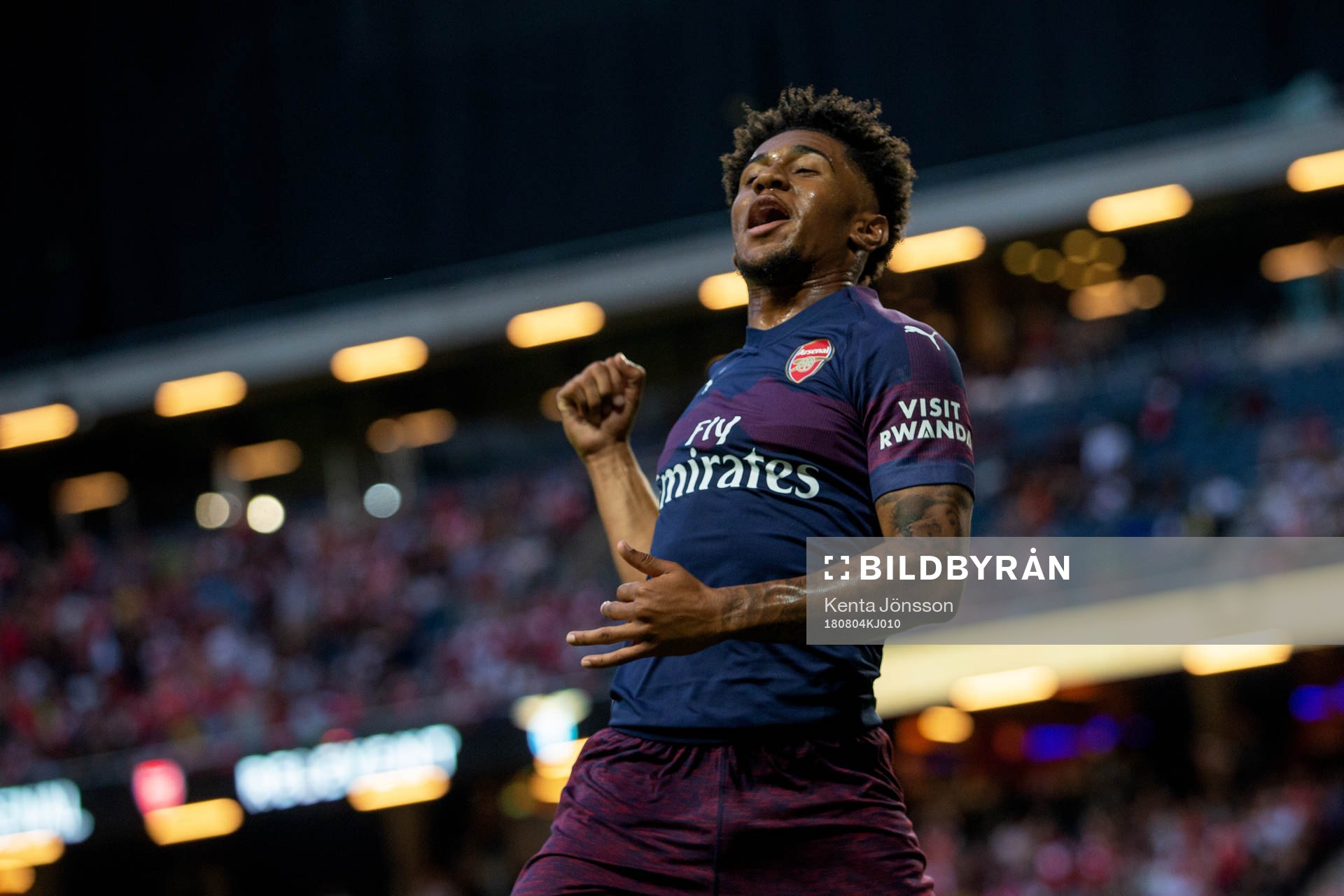 Reiss Nelson of Arsenal celebrates