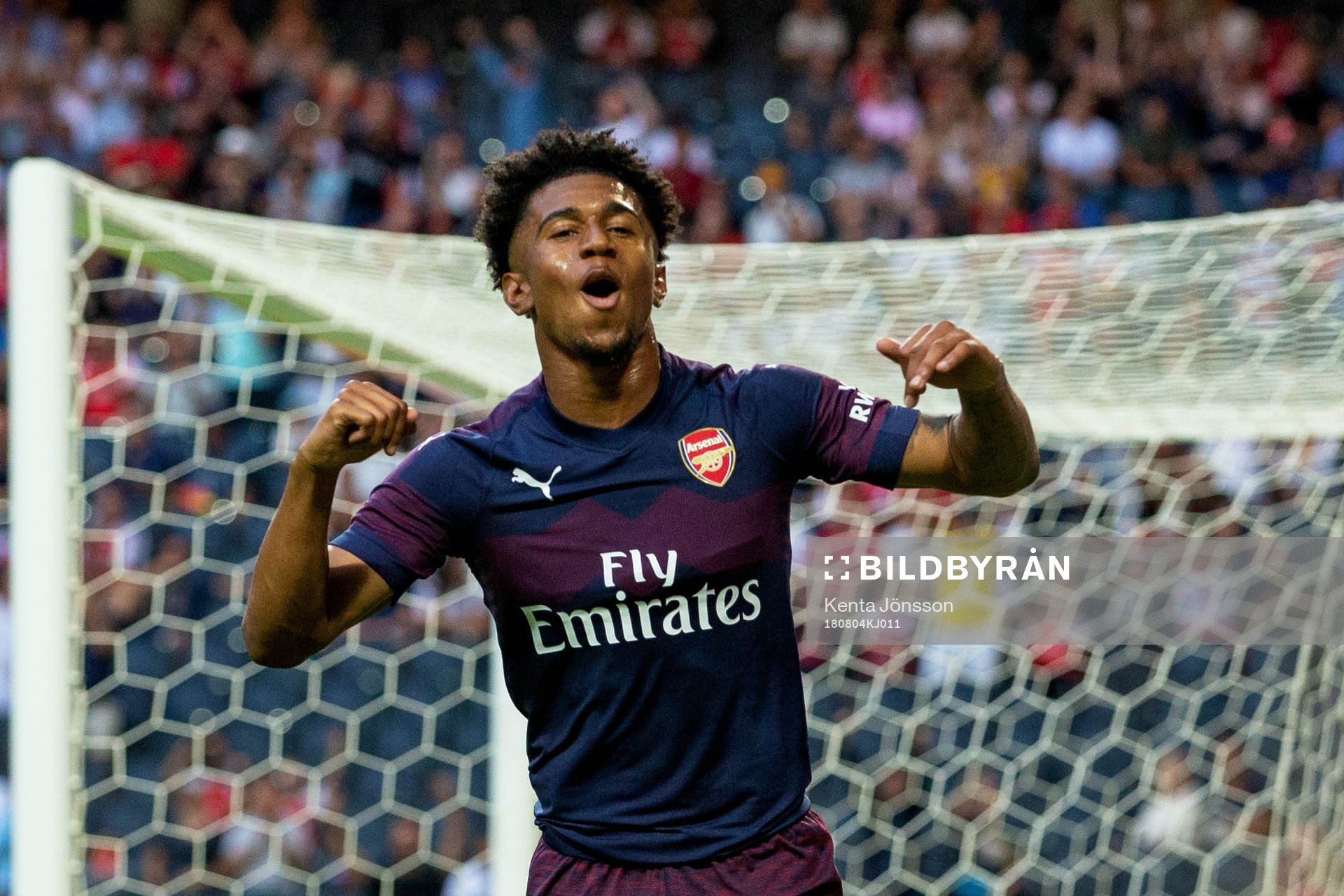 Reiss Nelson of Arsenal celebrates