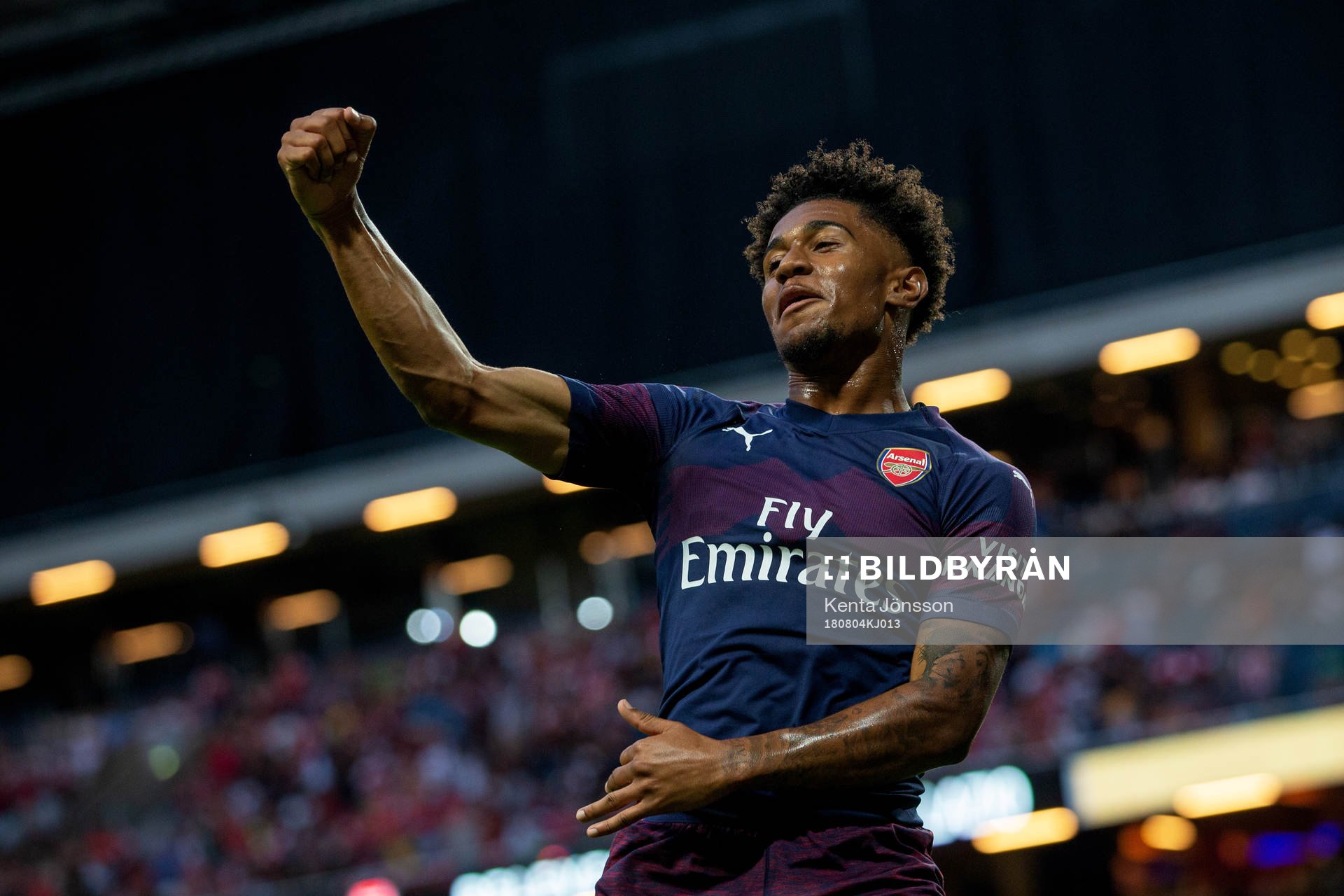 Reiss Nelson of Arsenal celebrates