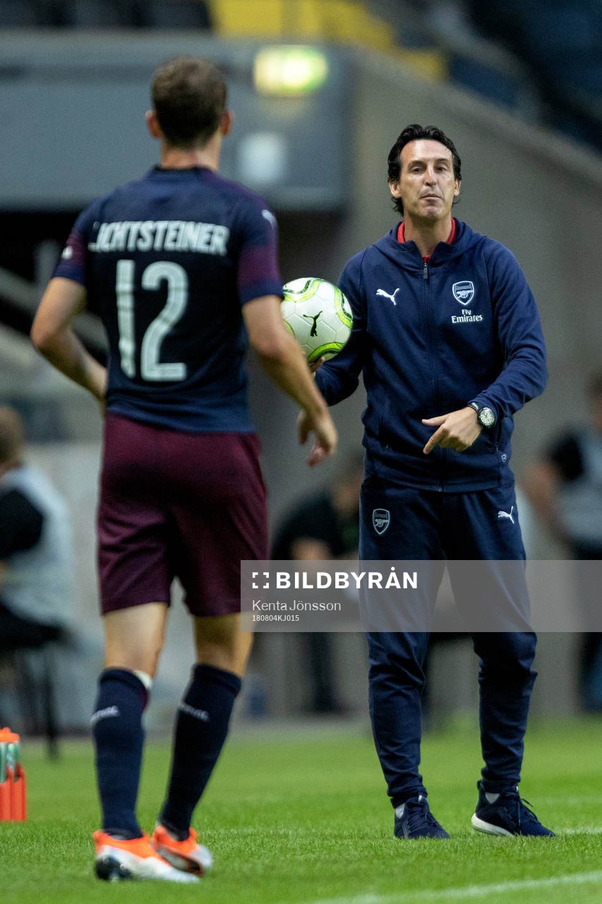 Stephan Lichtsteiner and coach Unai Emery of Arsenal