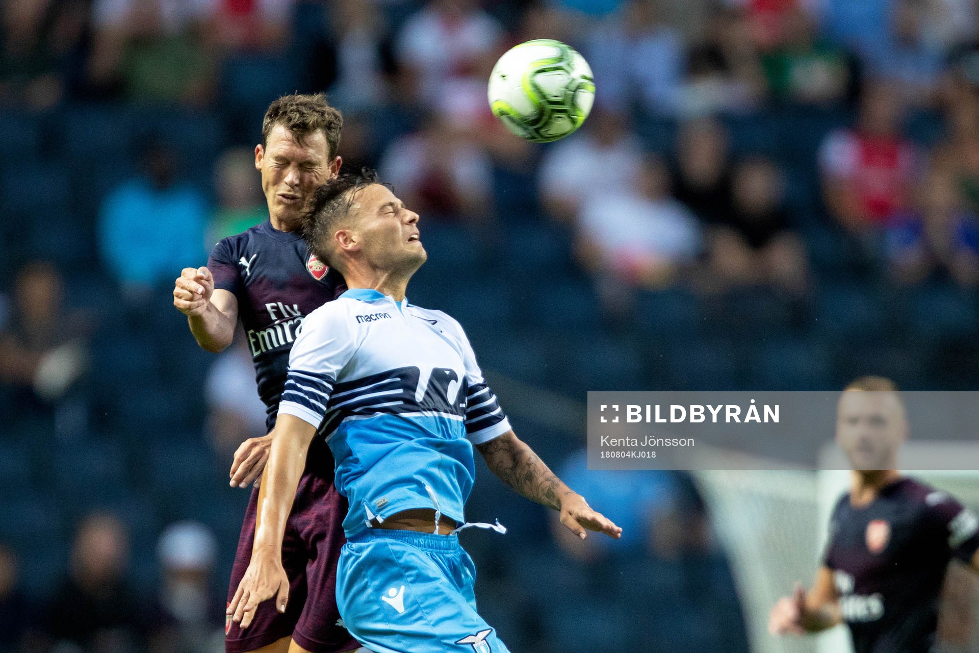 Stephan Lichtsteiner of Arsenal and Stefan Radu of Lazio