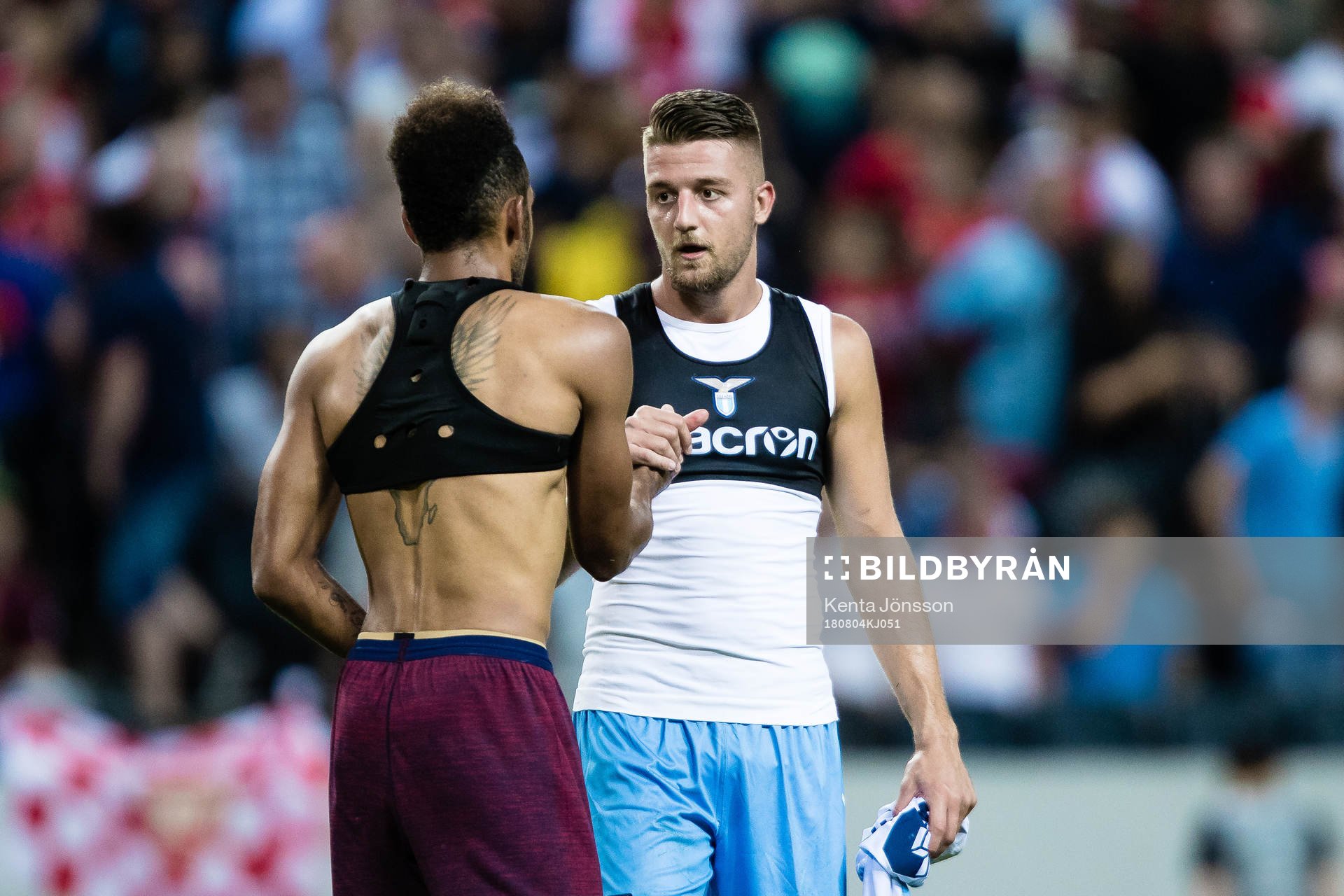 Sergej Milinkovic-Savic of Lazio changes match shirt with
