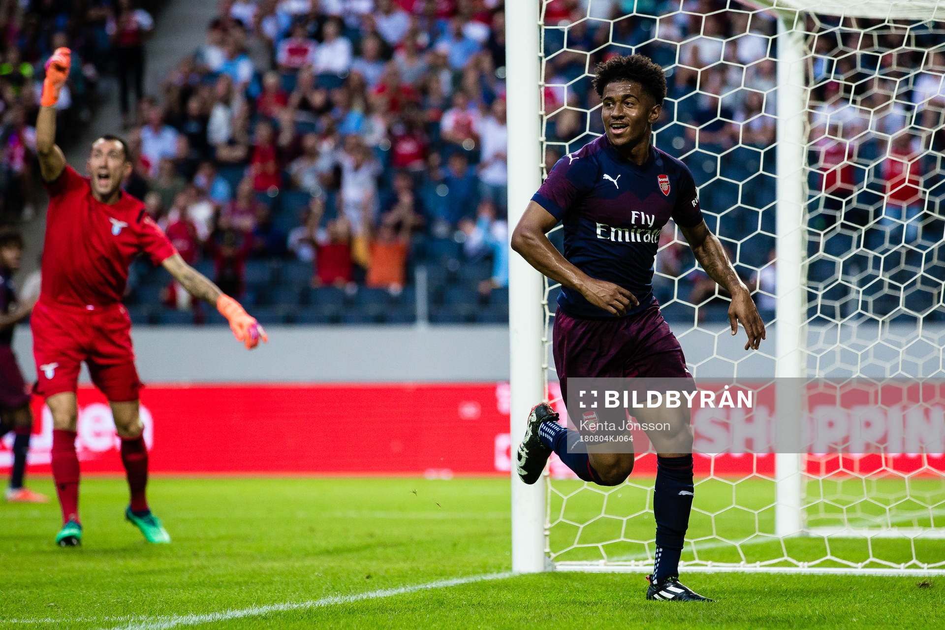 Reiss Nelson of Arsenal celebrates