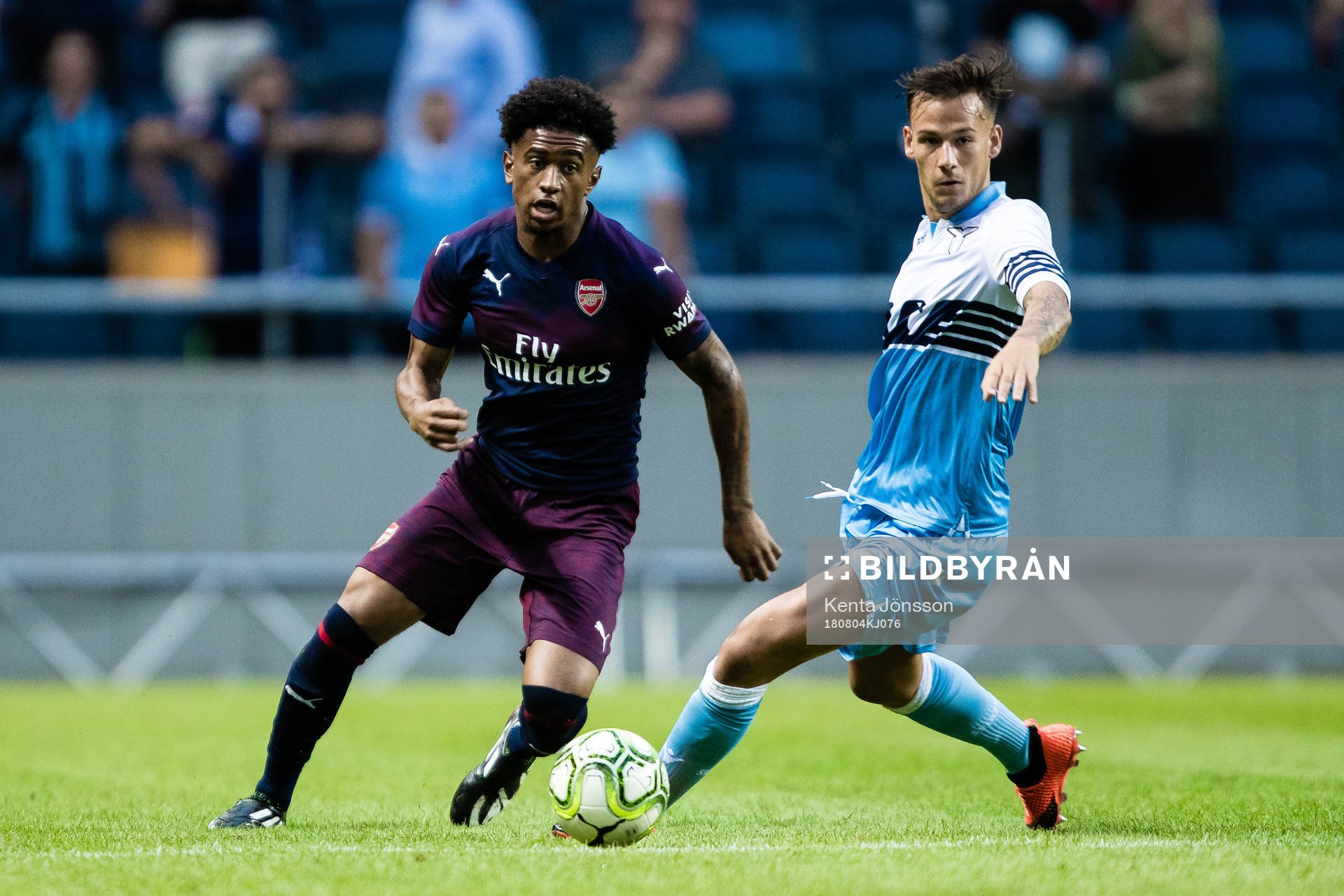 Reiss Nelson of Arsenal and Alessandro Murgia of Lazio
