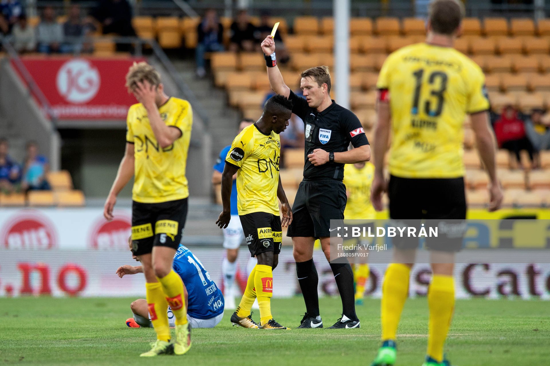 Ifeanyi Mathew of Lillestrøm gets a yellow card from Kai