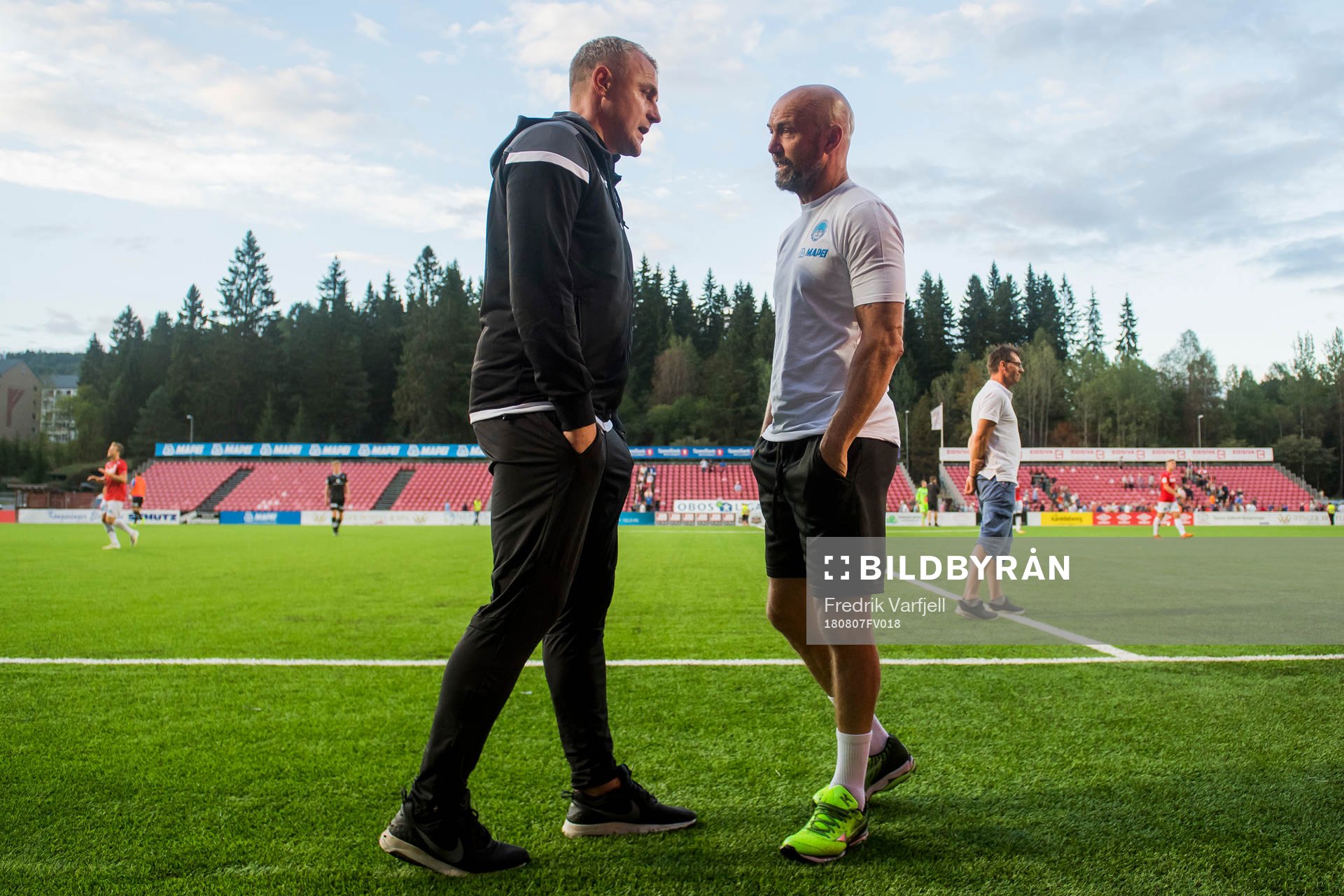 Bengt Sæternes, head coach of Sandnes Ulf, and Mark Dempsey, head coach of Kongsvinger, after the OBOS-ligaen match between Kongsvinger and Sandnes Ulf on August 7, 2018 in Kongsvinger.