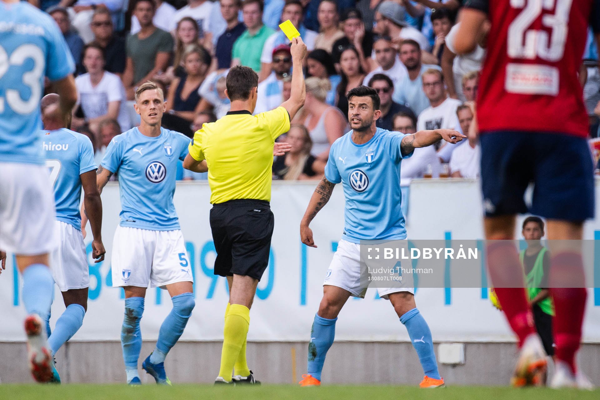 Behrang Safari of Malmö FF gets a yellow card
