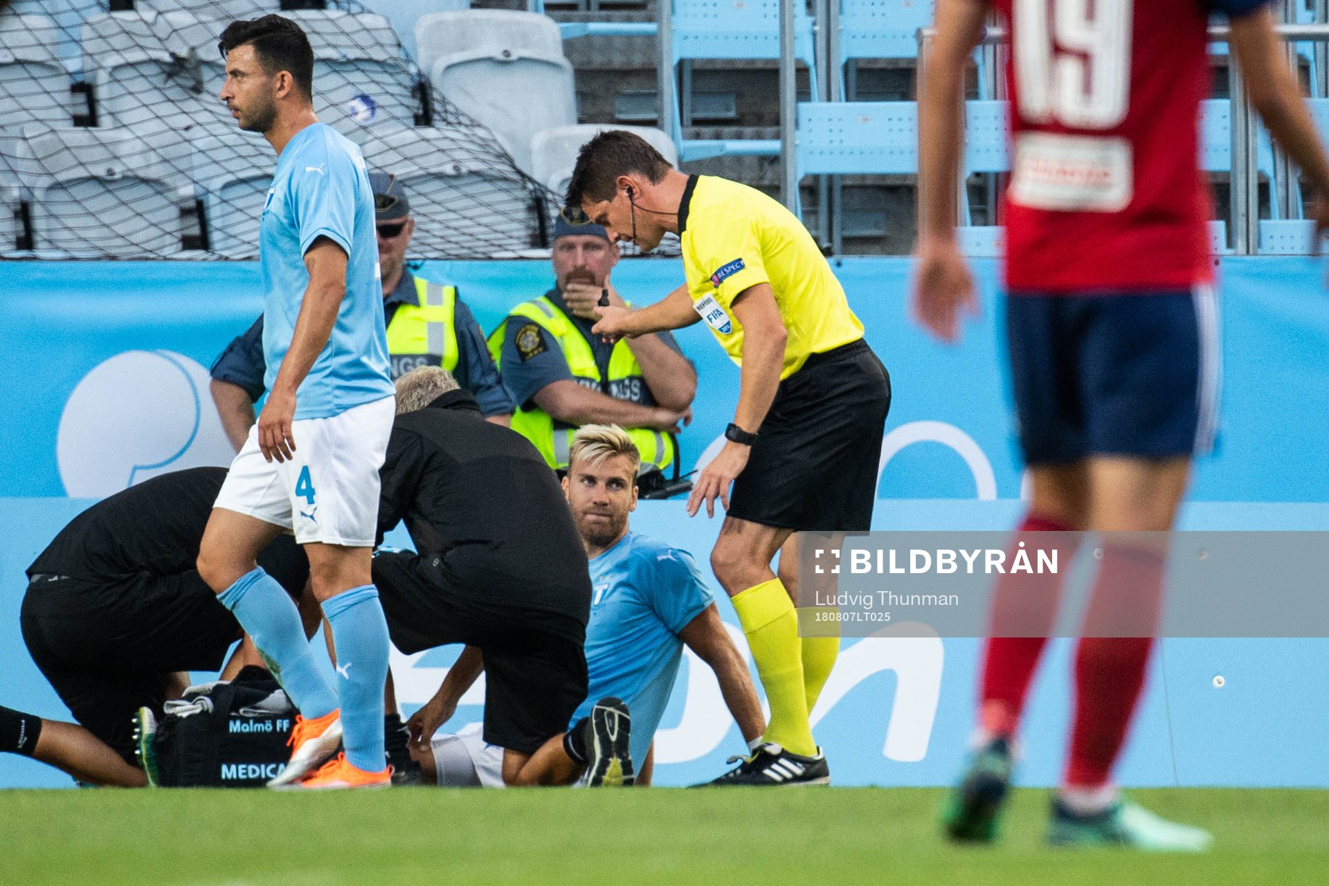 Rasmus Bengtsson of Malmö FF gets medical attention due to