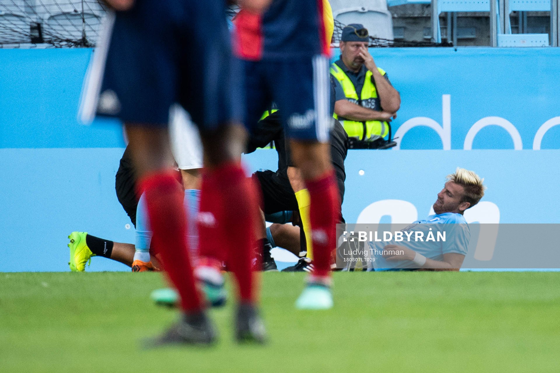 Rasmus Bengtsson of Malmö FF gets medical attention due to