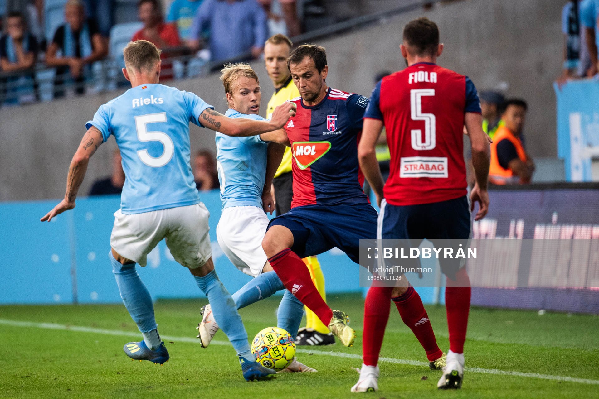 Oscar Lewicki of Malmö FF and Danko Lazović of Vidi
