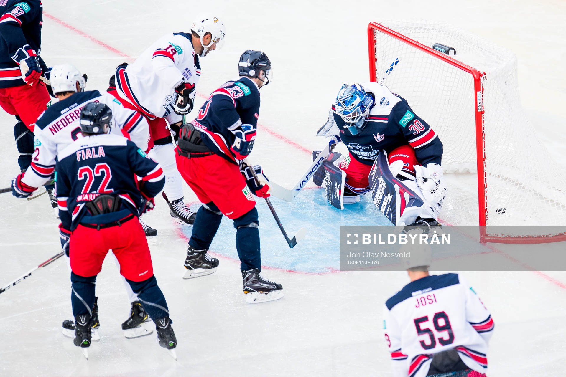 Goaltender Henrik Lundqvist of Team Henke lets in a goal