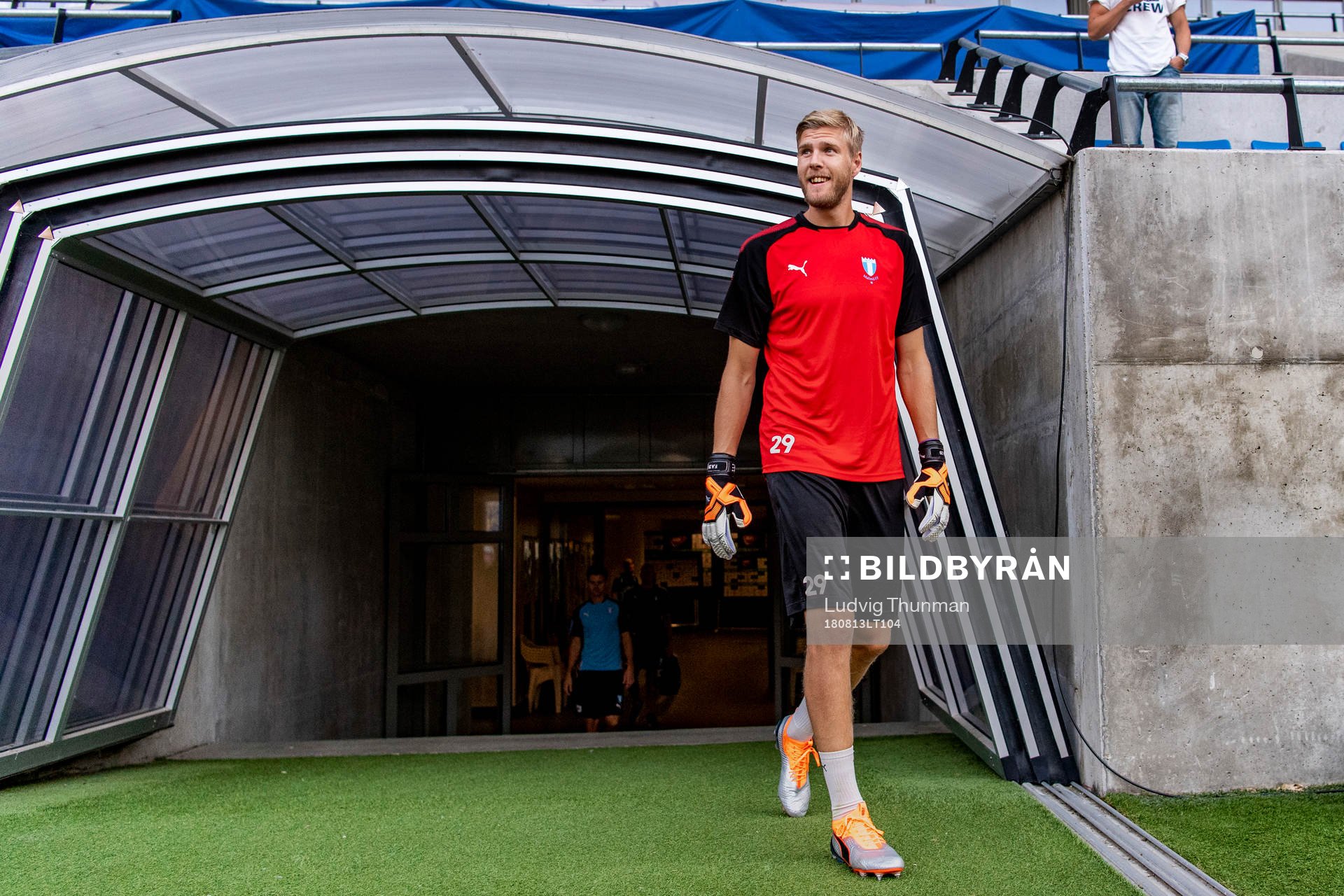 Goalkeeper Fredrik Andersson enters the pitch