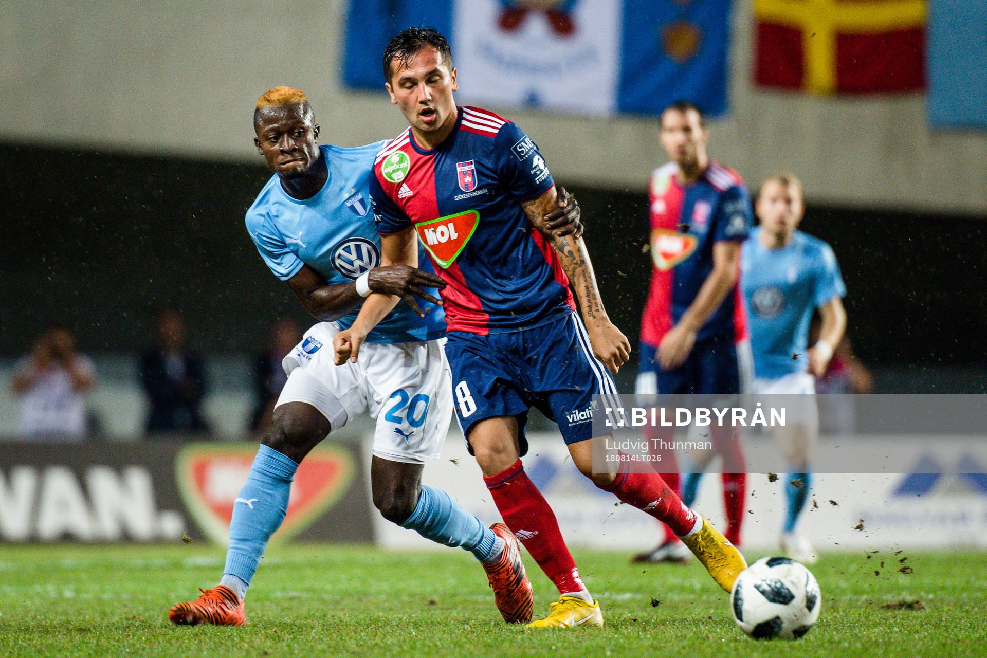 Bonke Innocent of Malmö FF and Anel Hadzic of Vidi during the UEFA Champions League qualifying match between Vidi and Malmö FF on August 14, 2018 in Felcsut.