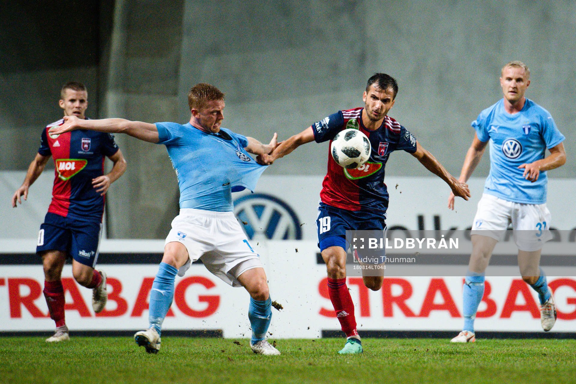 Anders Christiansen of Malmö FF against Boban Nikolov of Vidi during the UEFA Champions League qualifying match between Vidi and Malmö FF on August 14, 2018 in Felcsut.