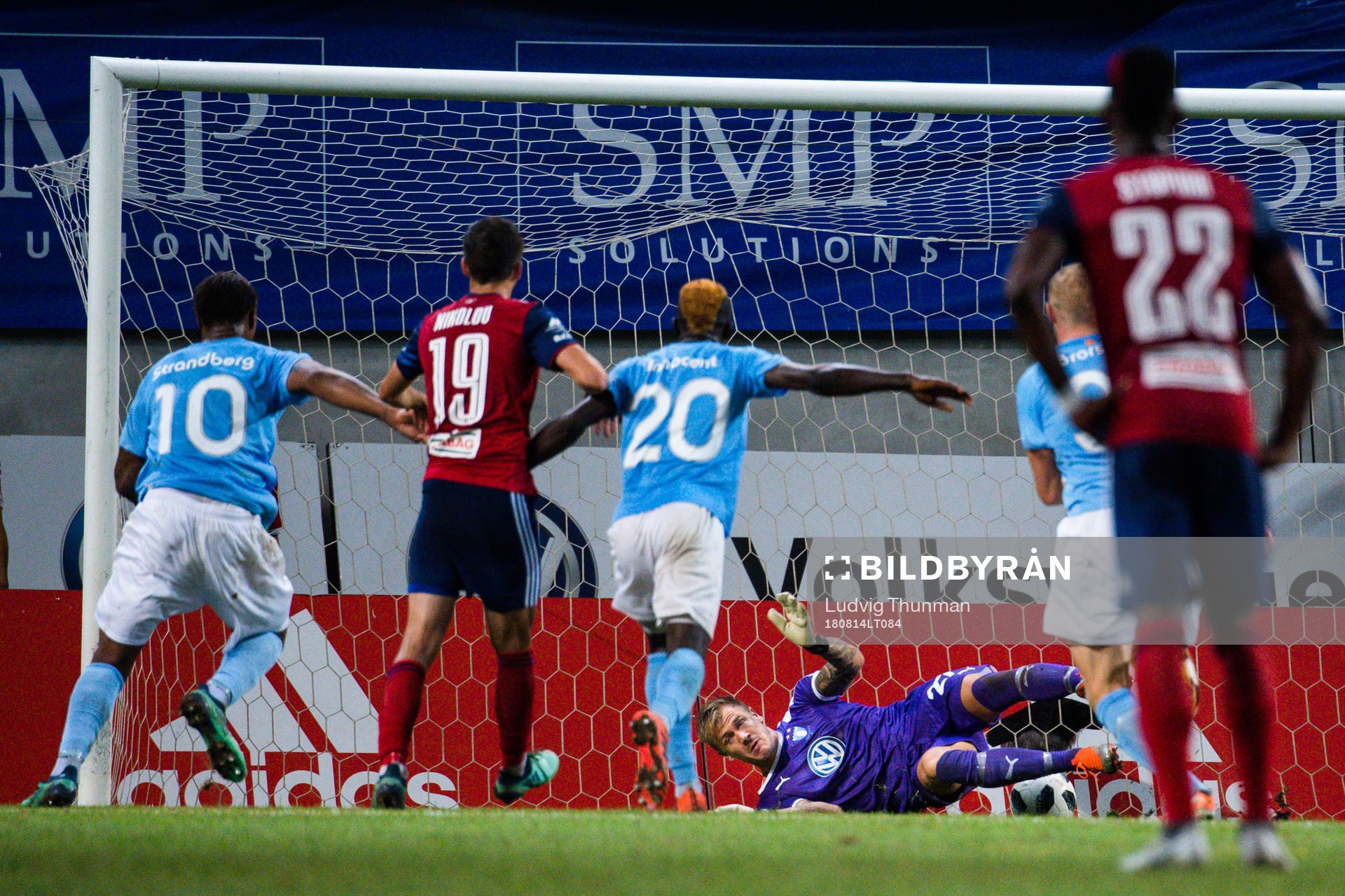 goalkeeper Johan Dahlin of Malmö FF saves a penalty kick