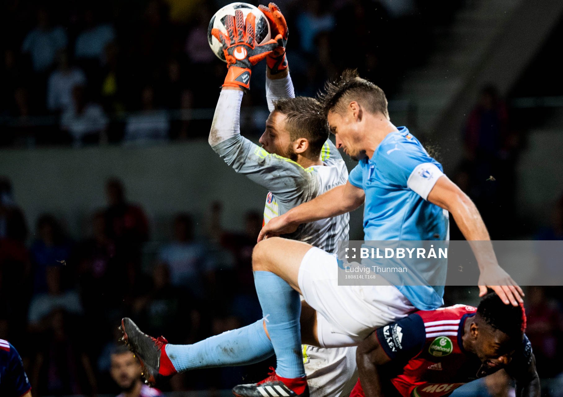 Markus Rosenberg of Malmö FF and goalkeeper Tomas Tujvelof