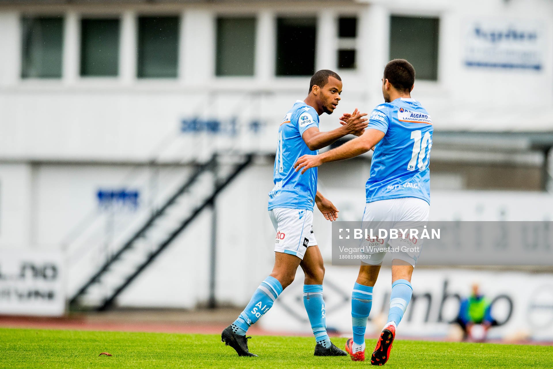 Erixon Danso of Sandnes Ulf celebrates with teammates Sanel