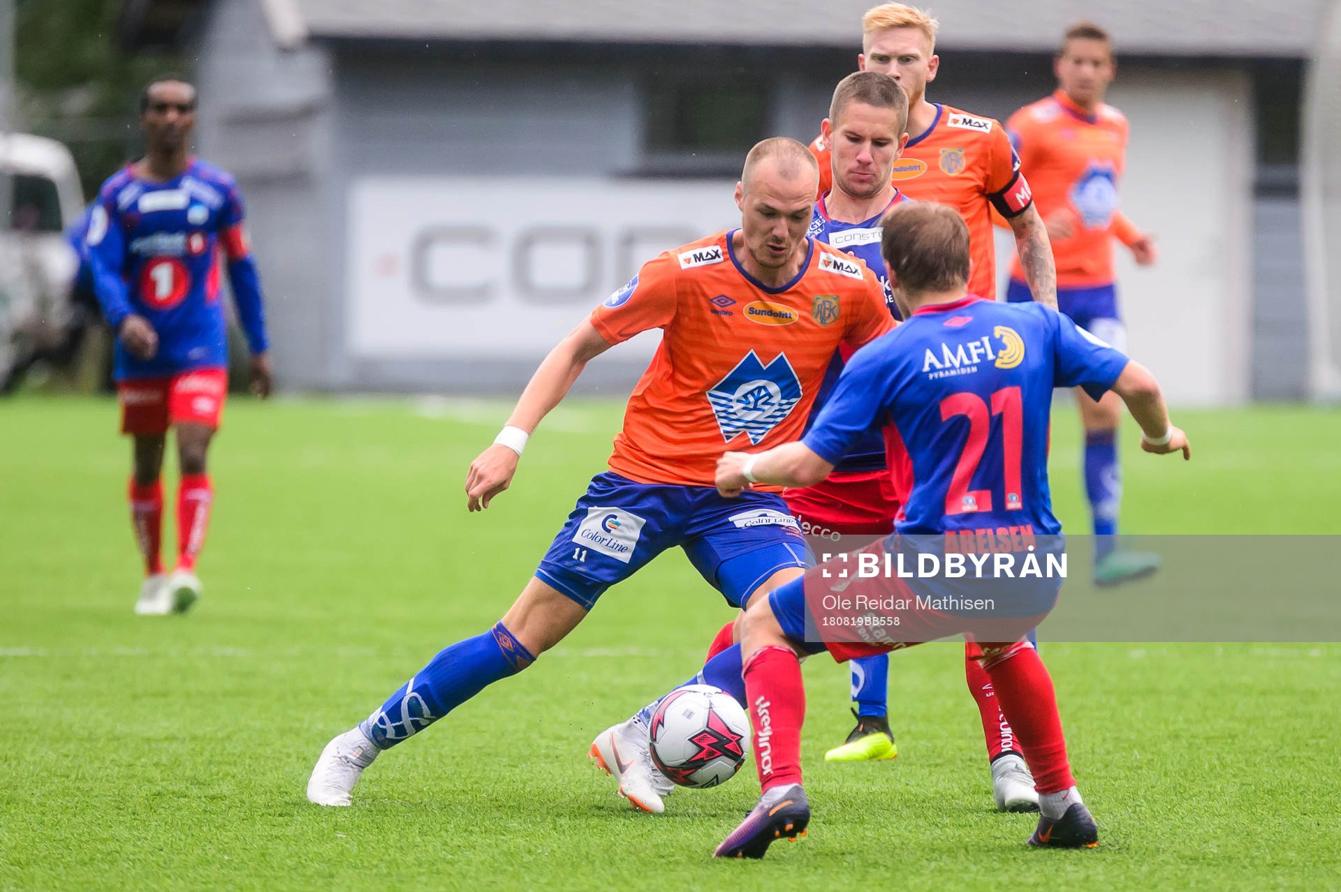 Aron Elís Thrándarson of Aalesund and Mathias Dahl Abelsen of Tromsdalen during the OBOS-ligaen match between Tromsdalen and Aalesund on August 19, 2018 in Tromsø.