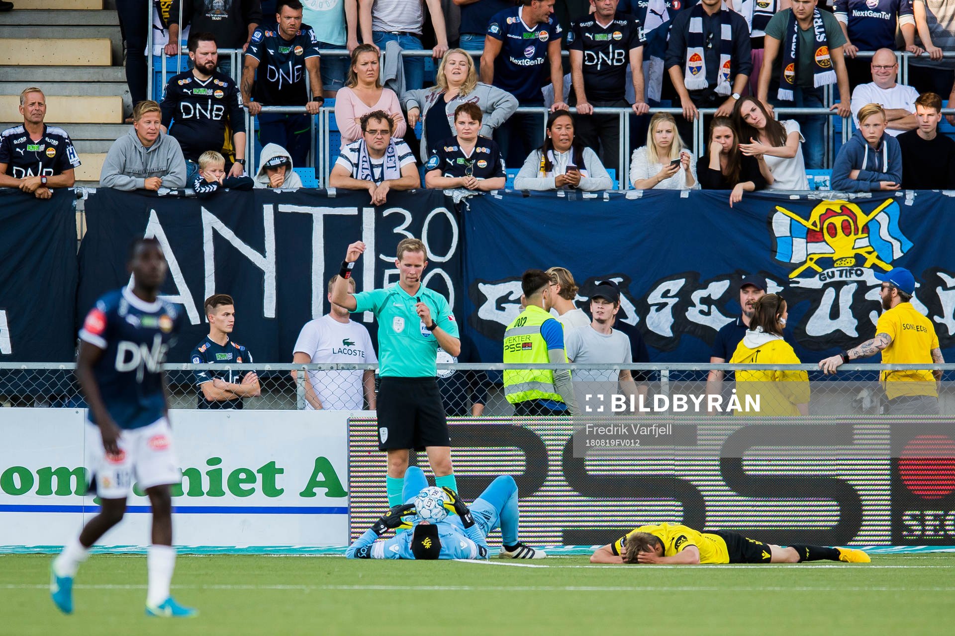 Goalkeeper Jonas Deumeland of Start lies down with an injury