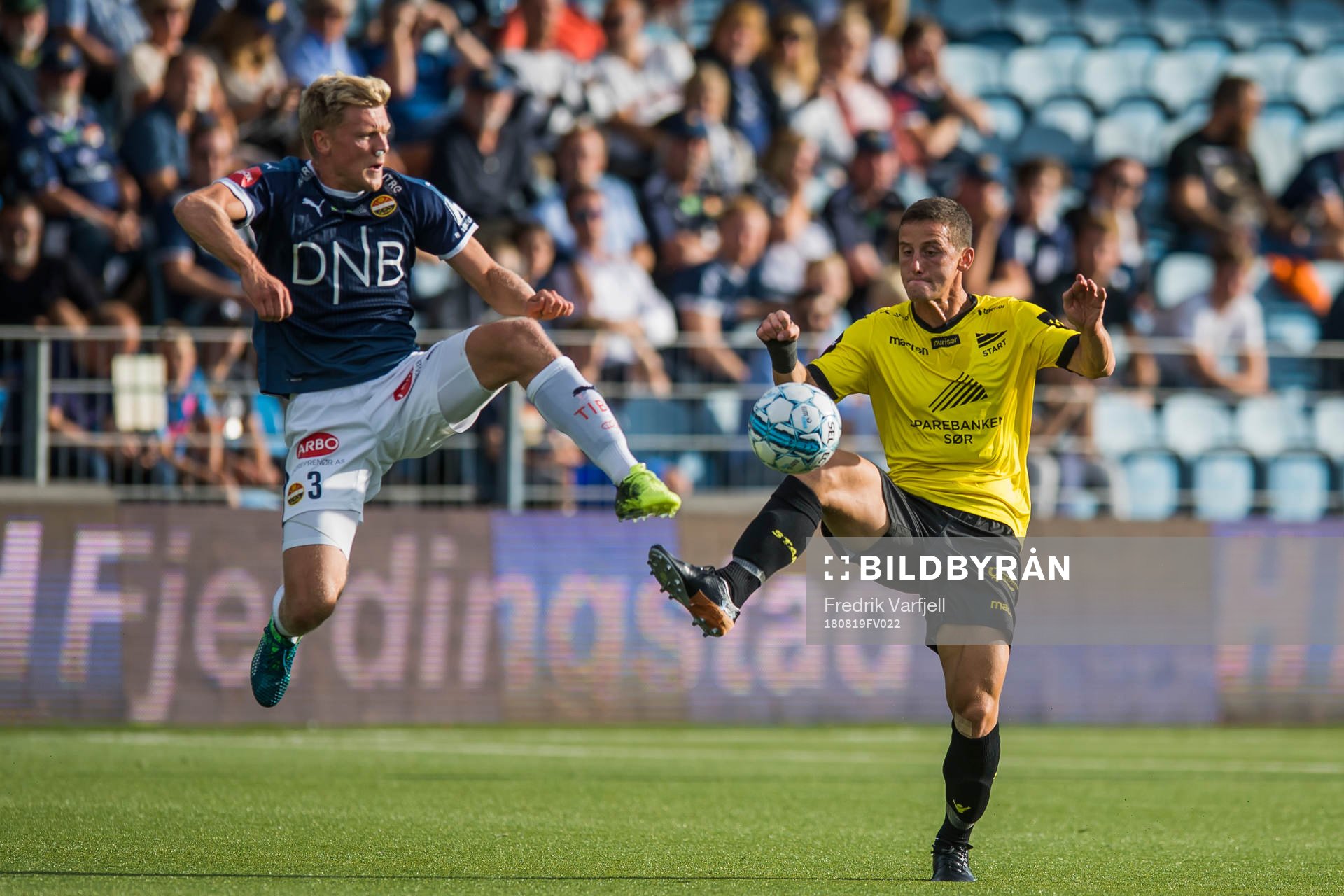 Jonathan Parr of Strømsgodset and Herolind Shala of Start