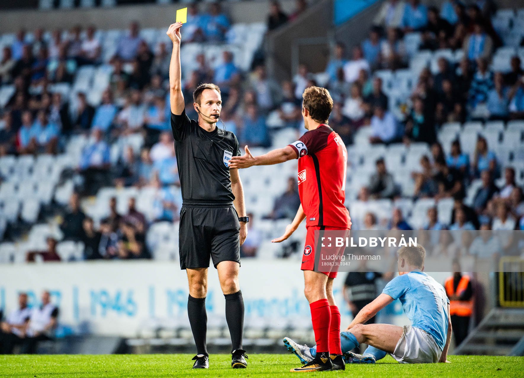 Jakob Poulsen of Midtjylland receives a warning