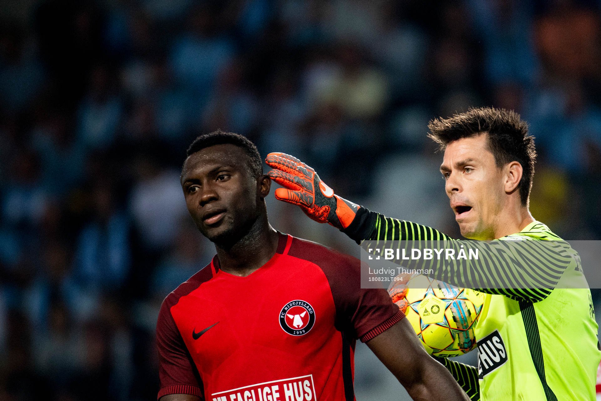 Bubacarr Sanneh and goalkeeper Jesper Hansen of Midtjylland