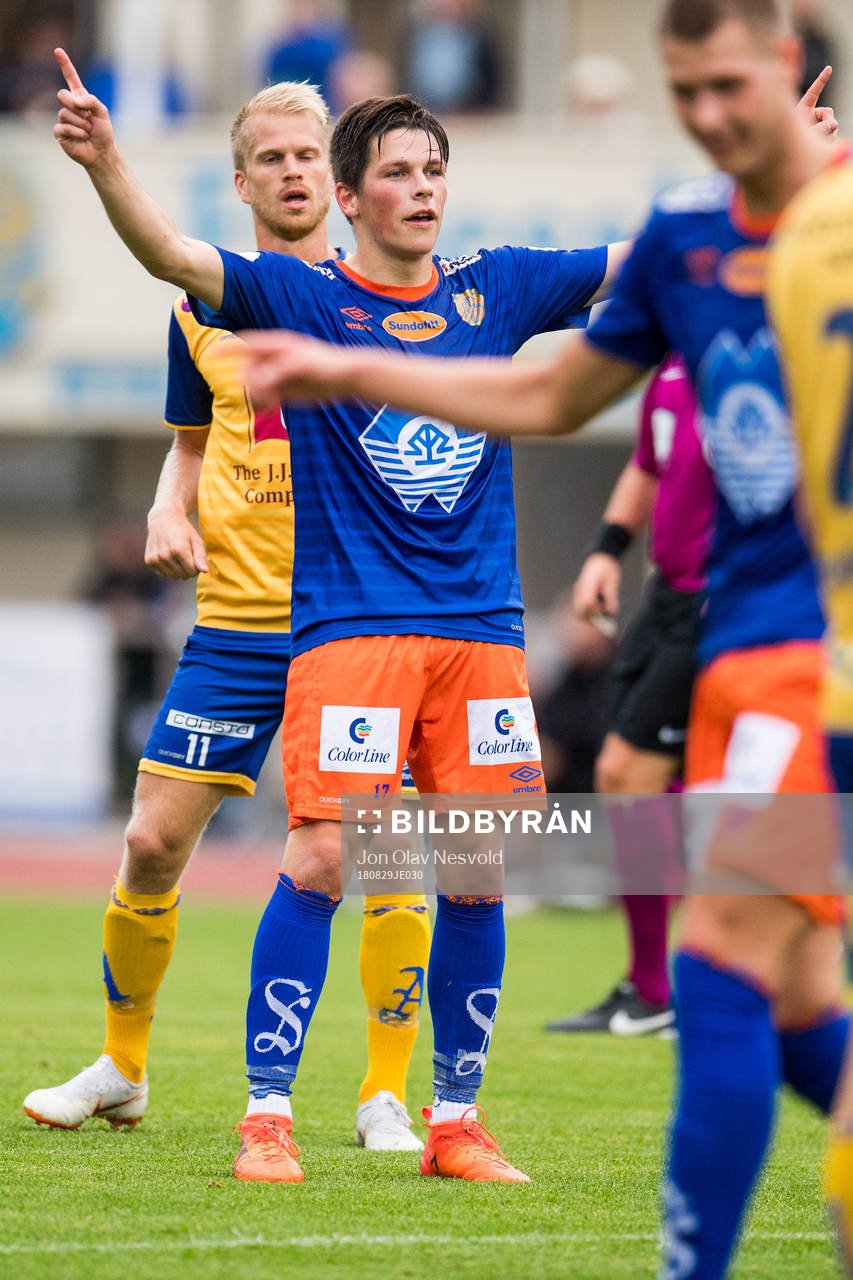 Sondre Fet of Aalesund celebrates the 0-3 goal while Daniel