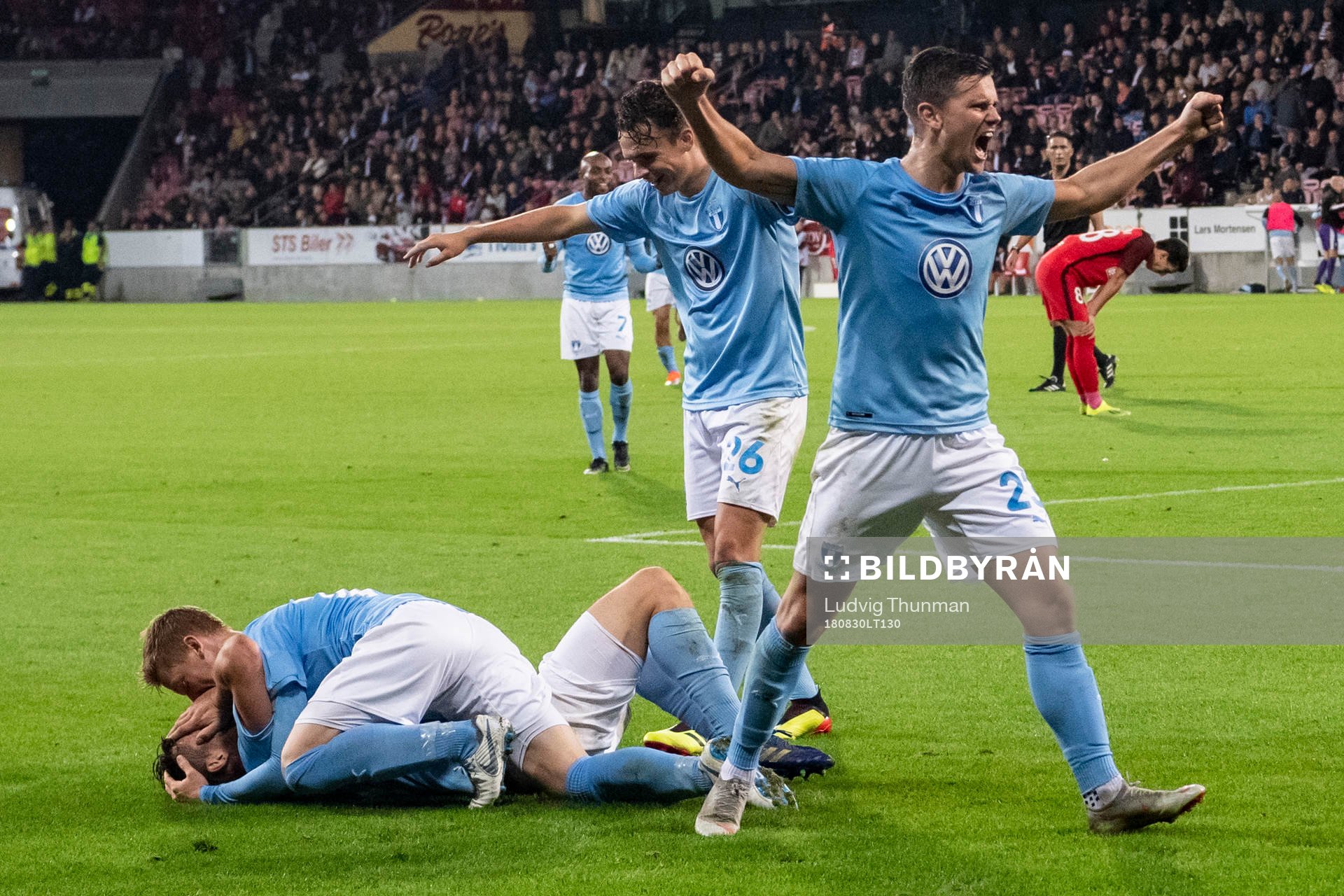 Markus Rosenberg is celebrated by Anders Christiansen,