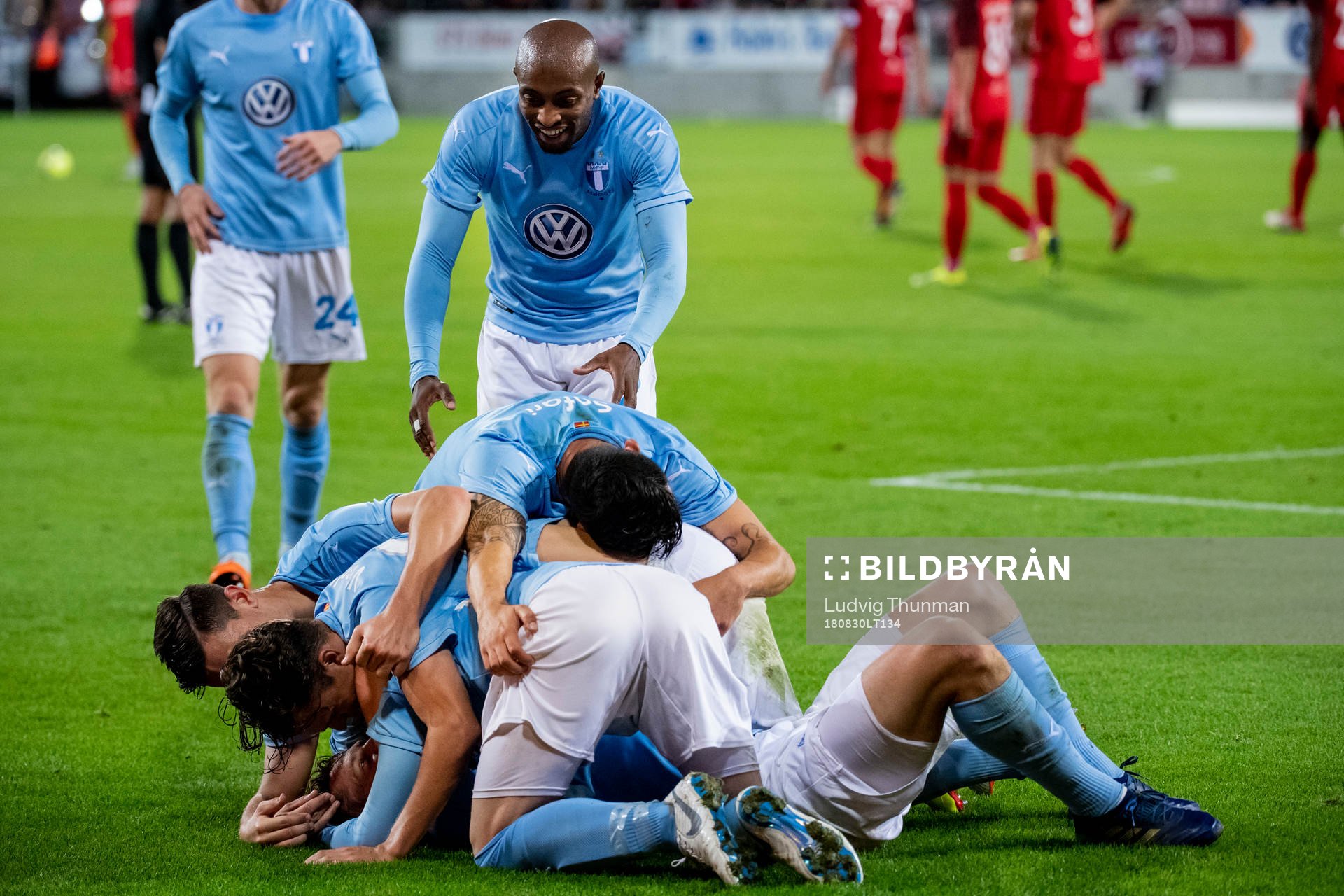 Markus Rosenberg of Malmö FF is celebrated by his teammates