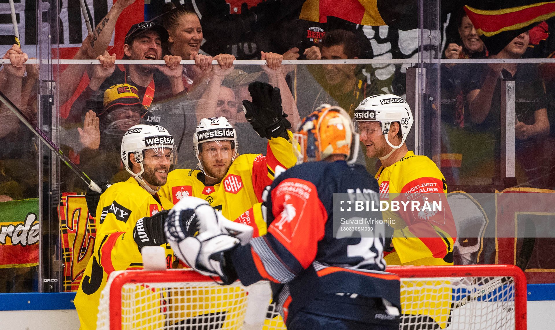 Marc Kämpf of Bern celebrates with teammates