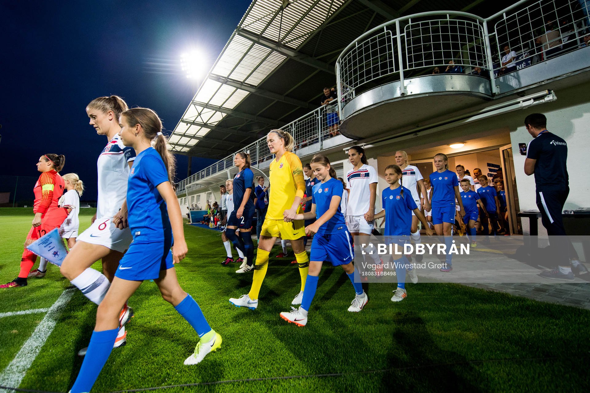 Maren Mjelde, goalkeeper Ingrid Hjelmseth of Norway and the other players enter the pitch ahead of the FIFA Women's World Cup Qualifier match between Slovakia and Norway on August 31, 2018 in Senec.
