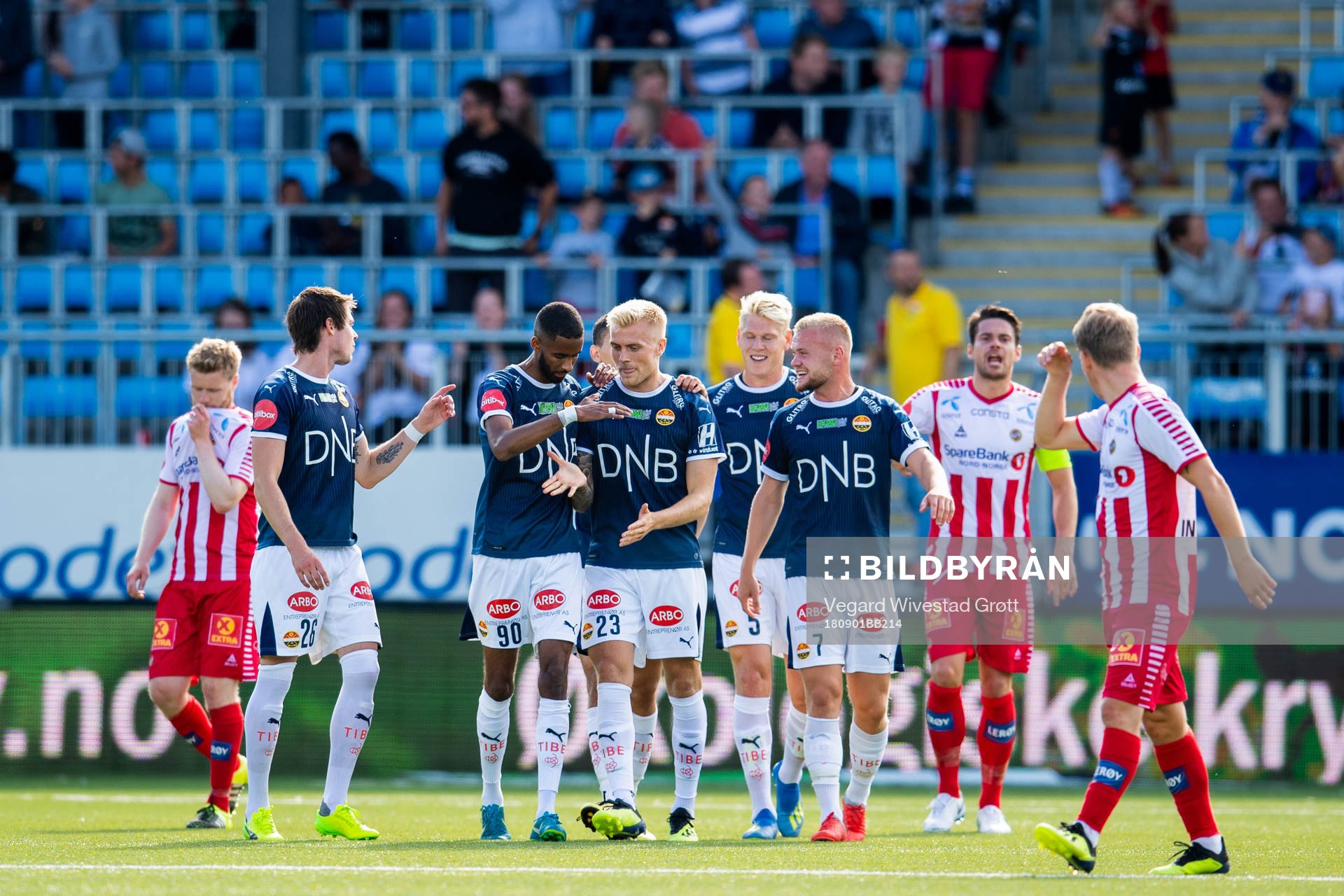 Eirik Ulland Andersen of Strømsgodset celebrates with team